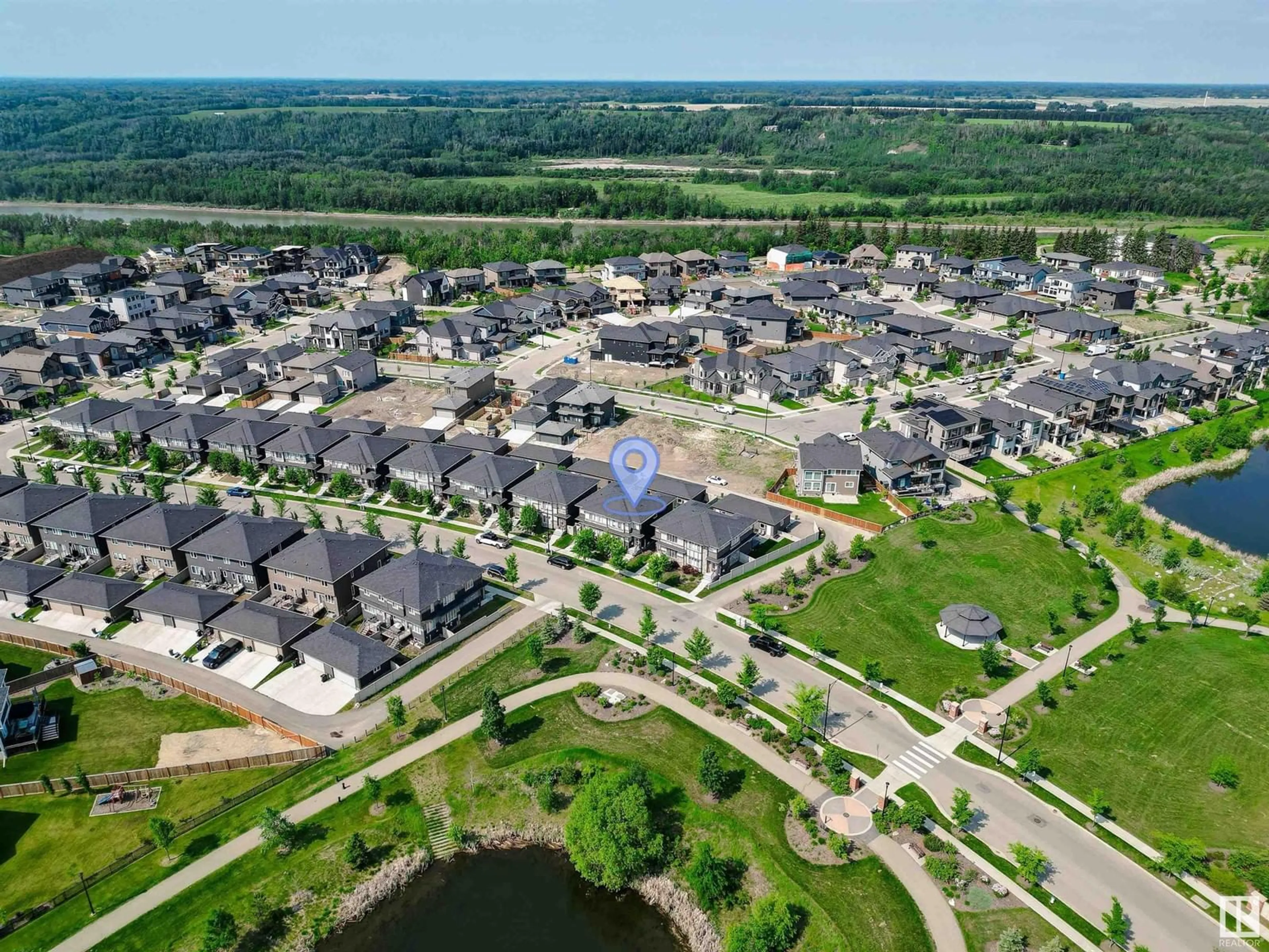 A pic from outside/outdoor area/front of a property/back of a property/a pic from drone, street for SW - 3106 KESWICK WY, Edmonton Alberta T6W3X5