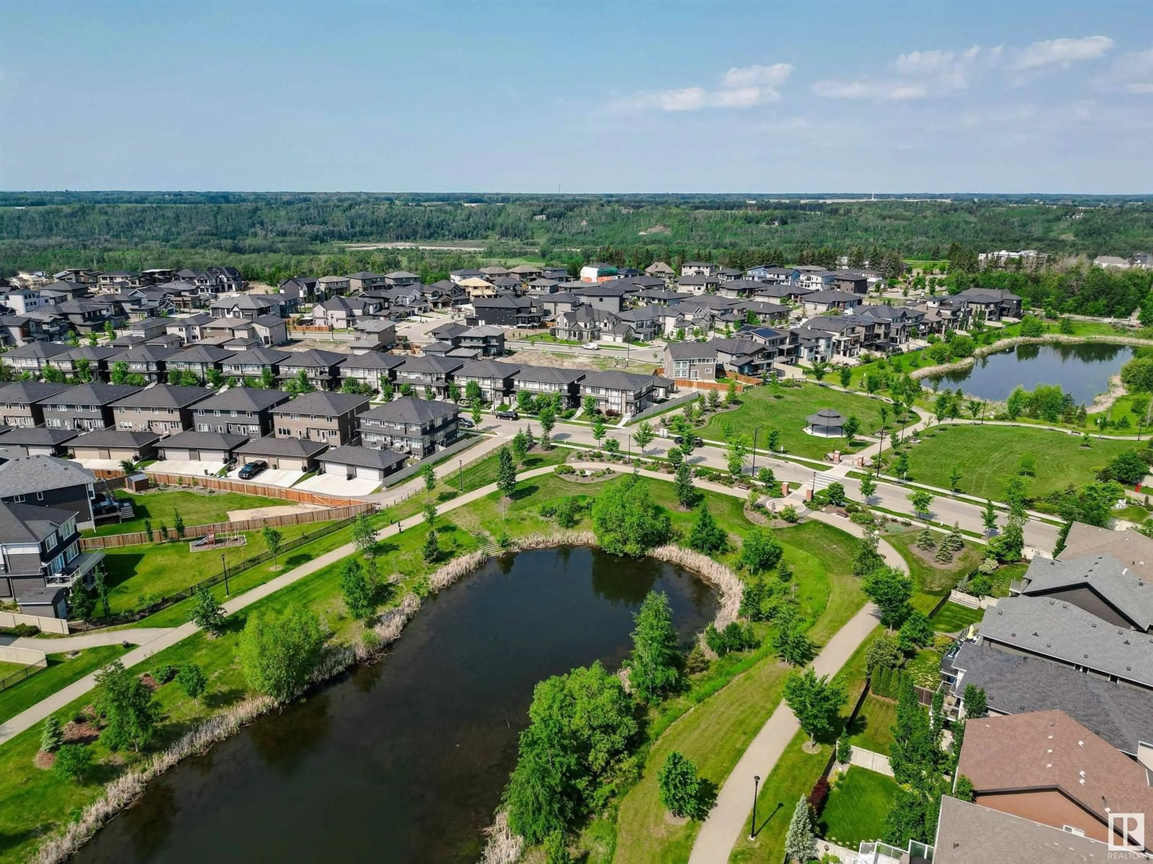 A pic from outside/outdoor area/front of a property/back of a property/a pic from drone, water/lake/river/ocean view for SW - 3106 KESWICK WY, Edmonton Alberta T6W3X5
