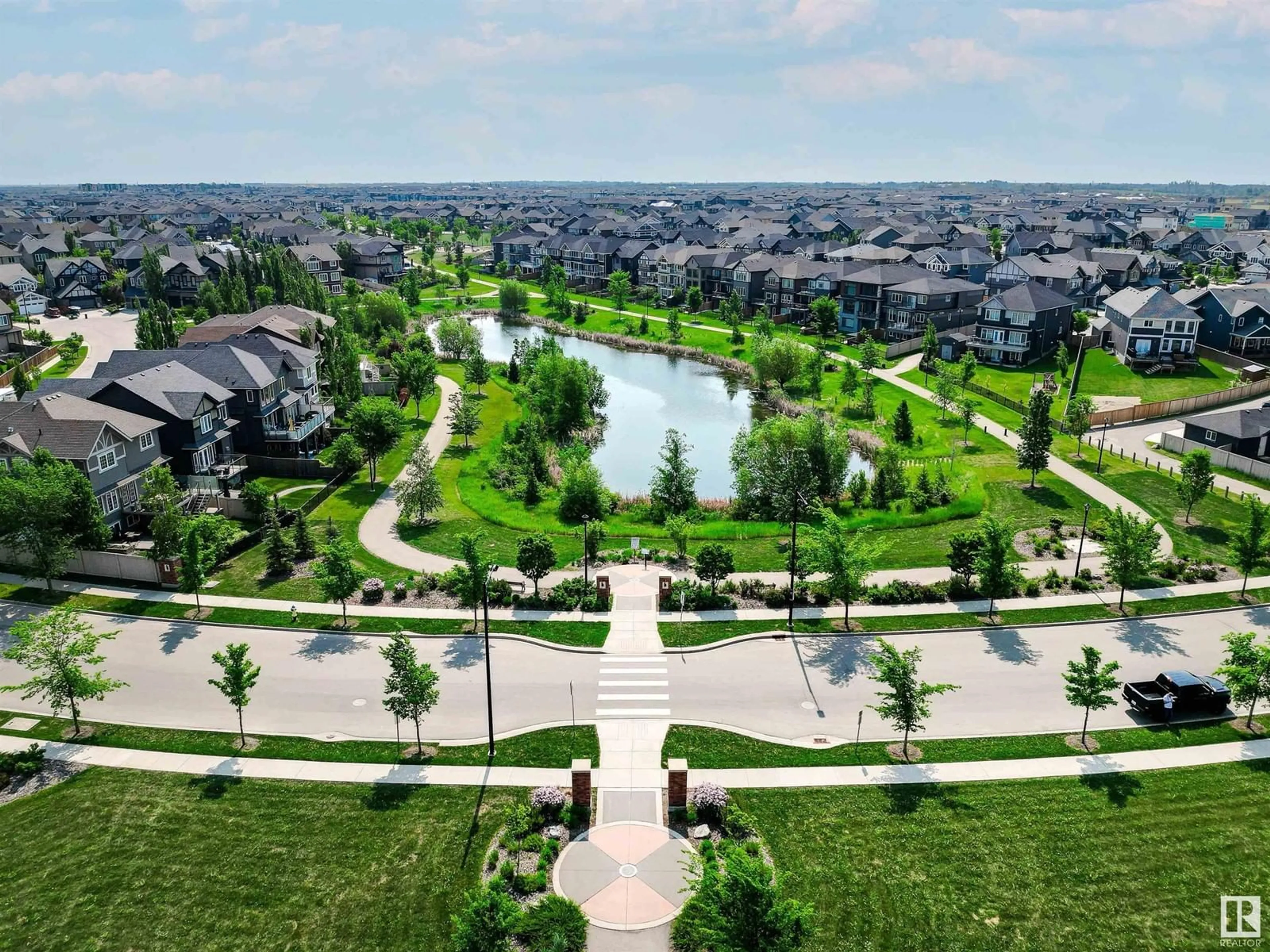 A pic from outside/outdoor area/front of a property/back of a property/a pic from drone, water/lake/river/ocean view for SW - 3106 KESWICK WY, Edmonton Alberta T6W3X5