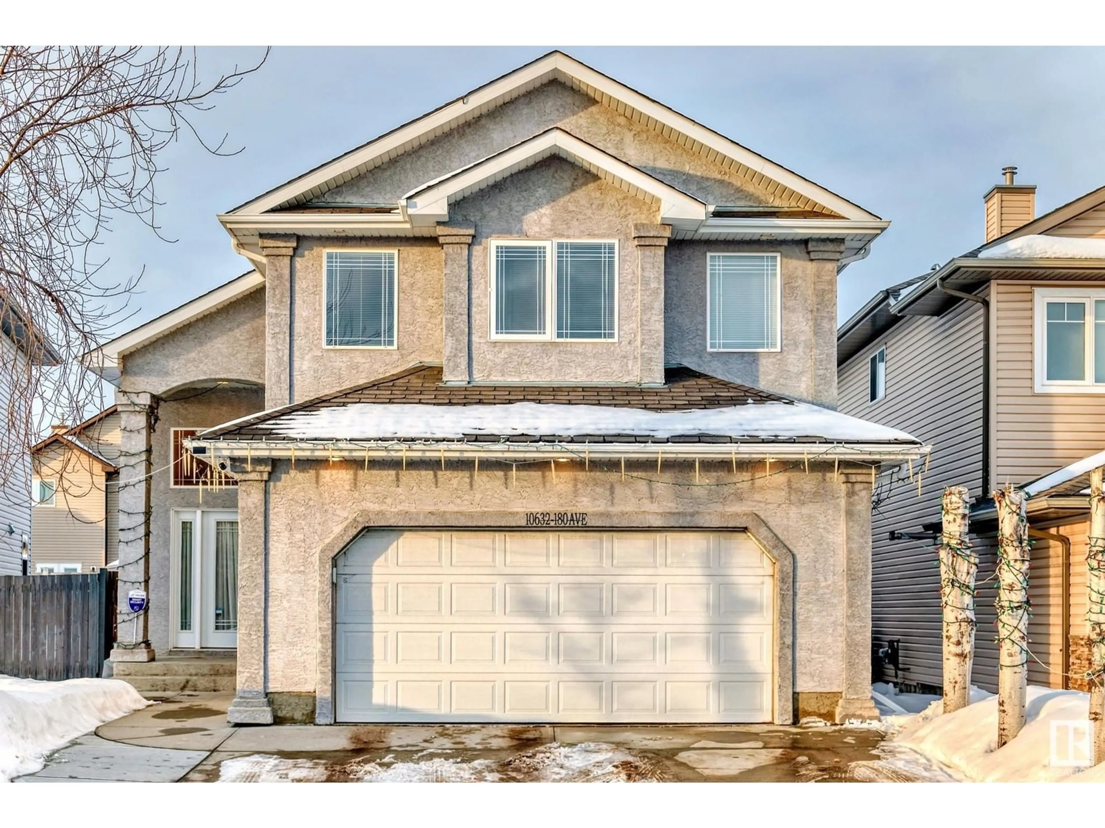 Home with vinyl exterior material, street for 10632 180 AV, Edmonton Alberta T5X6J9