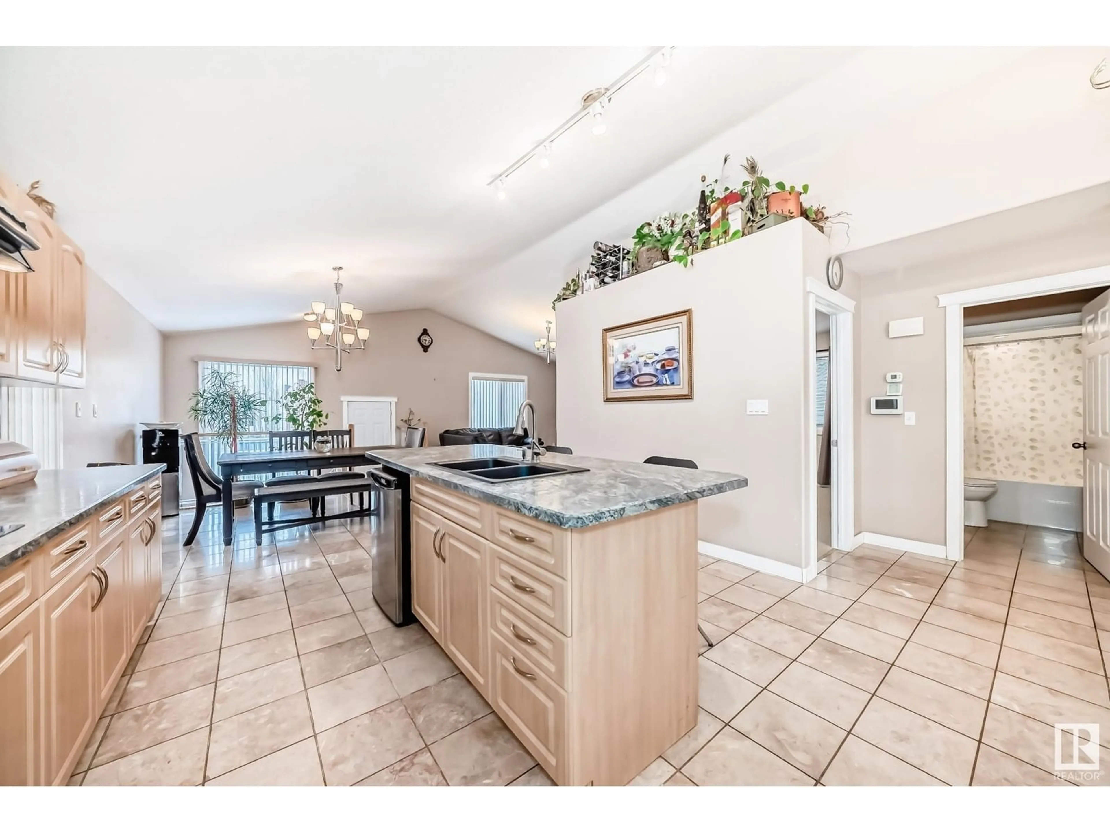 Open concept kitchen, ceramic/tile floor for 10632 180 AV, Edmonton Alberta T5X6J9