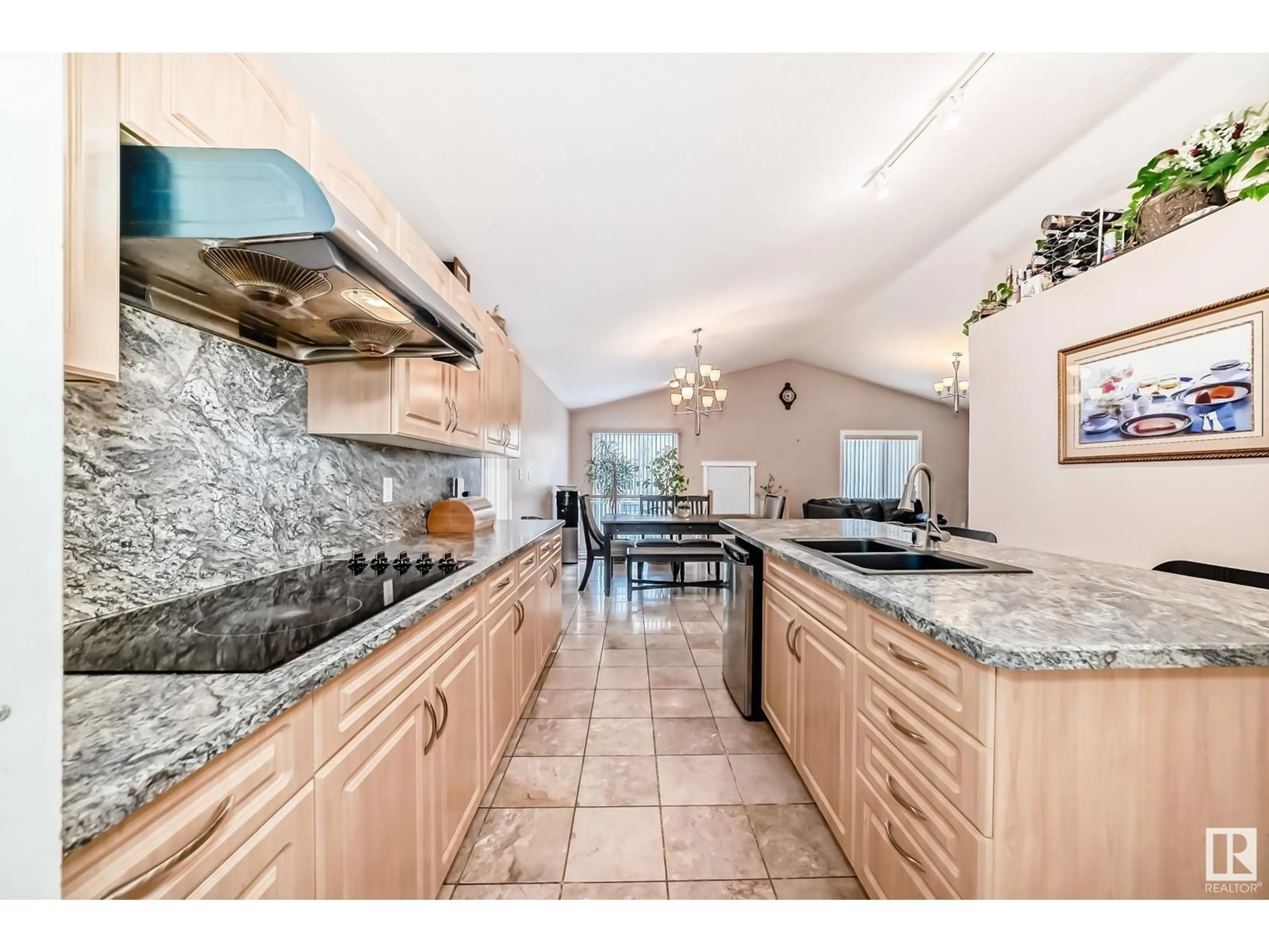 Open concept kitchen, ceramic/tile floor for 10632 180 AV, Edmonton Alberta T5X6J9