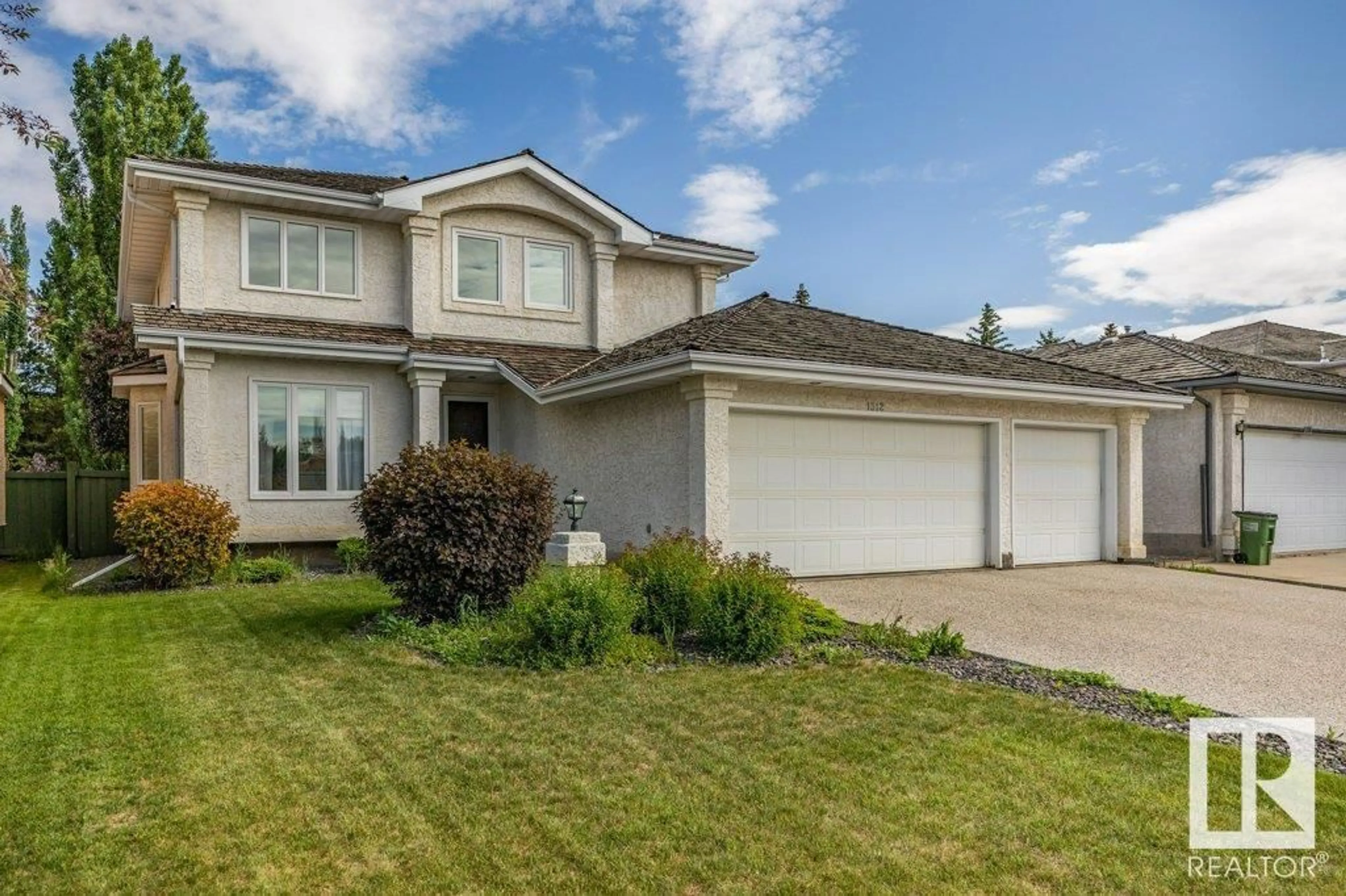 Home with vinyl exterior material, street for 1312 WELBOURN LN, Edmonton Alberta T6M2M2