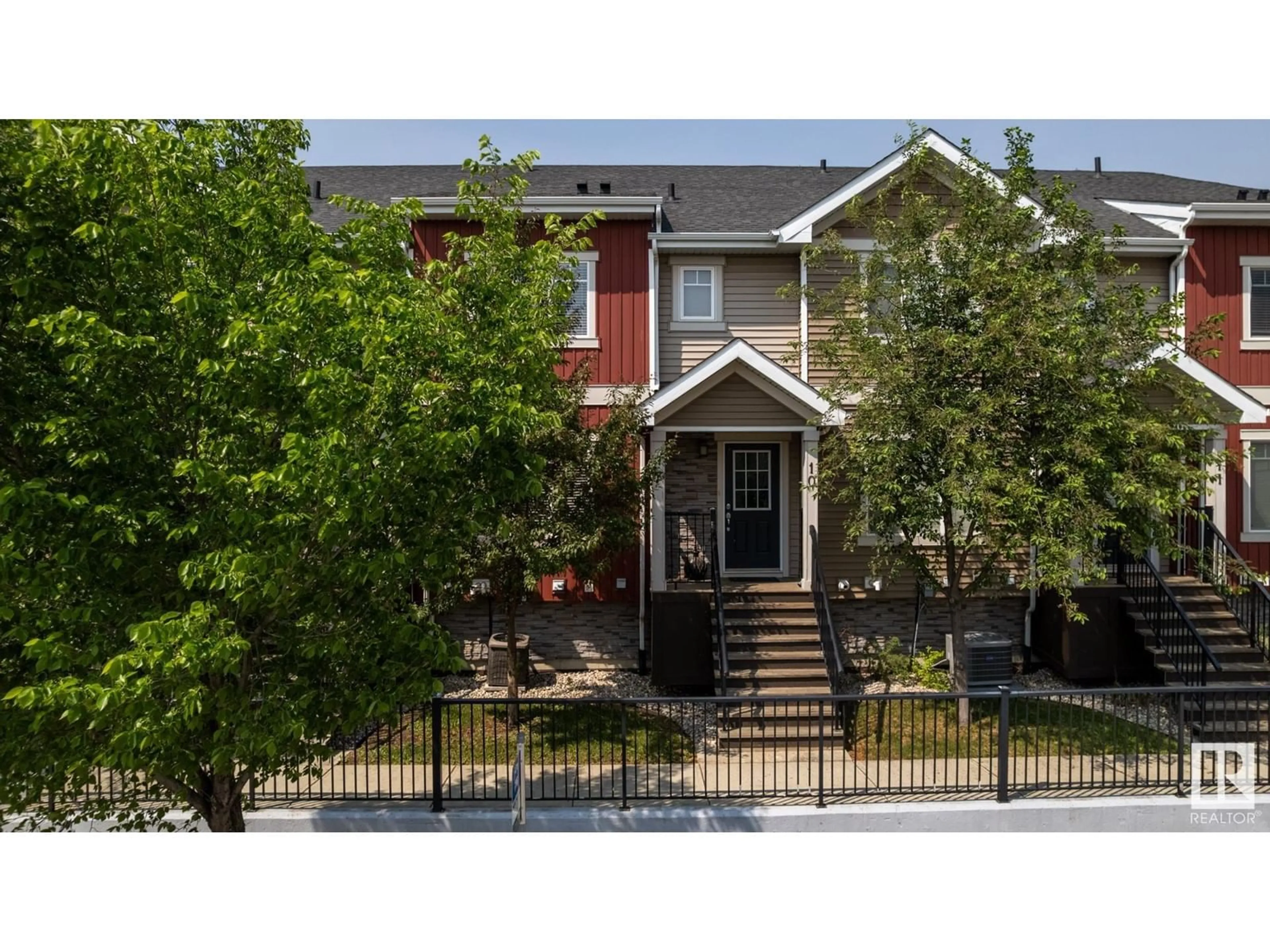 Home with vinyl exterior material, street for #10 - 13810 166 AV, Edmonton Alberta T6V0K4