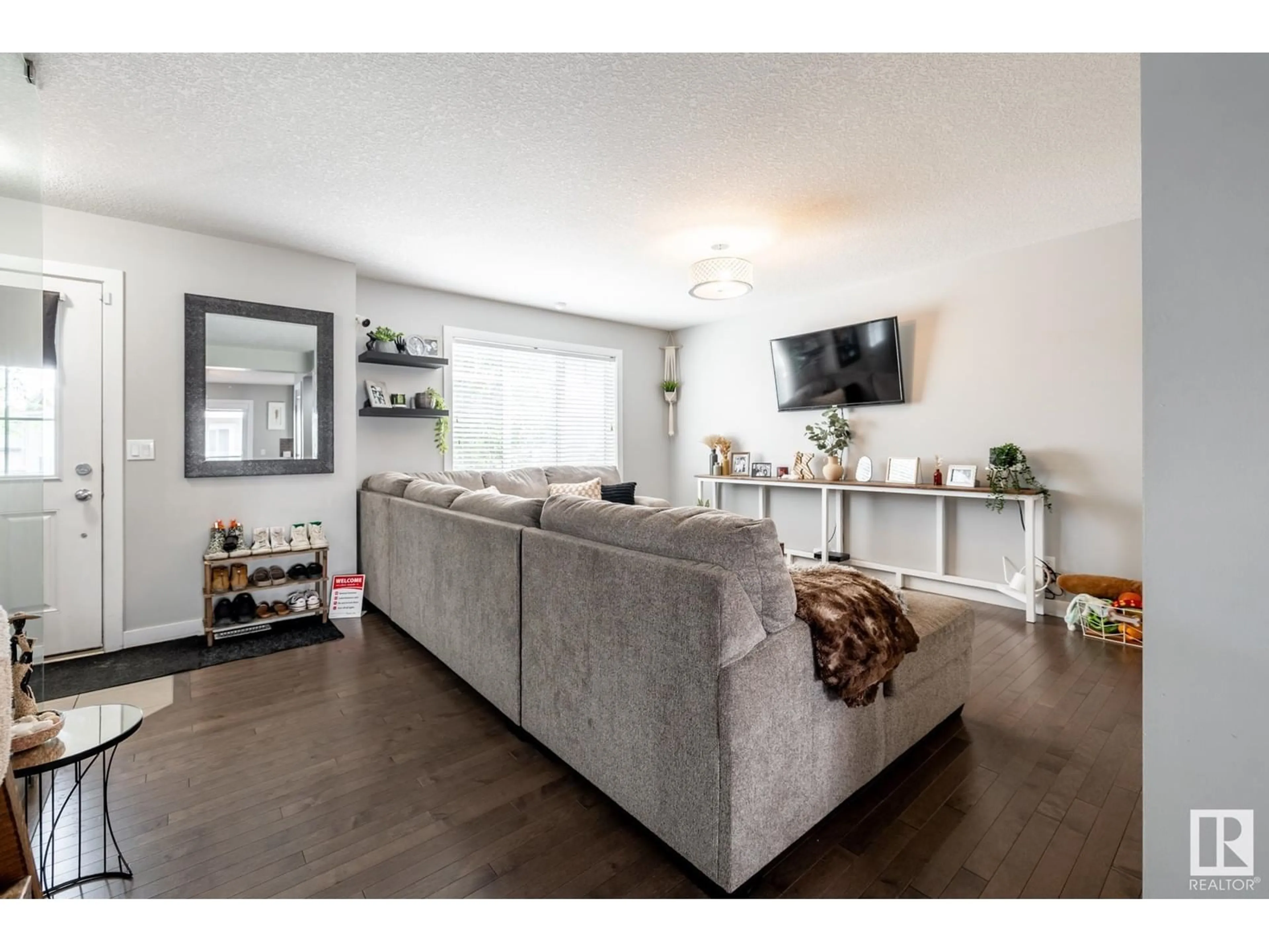 Living room with furniture, unknown for #10 - 13810 166 AV, Edmonton Alberta T6V0K4