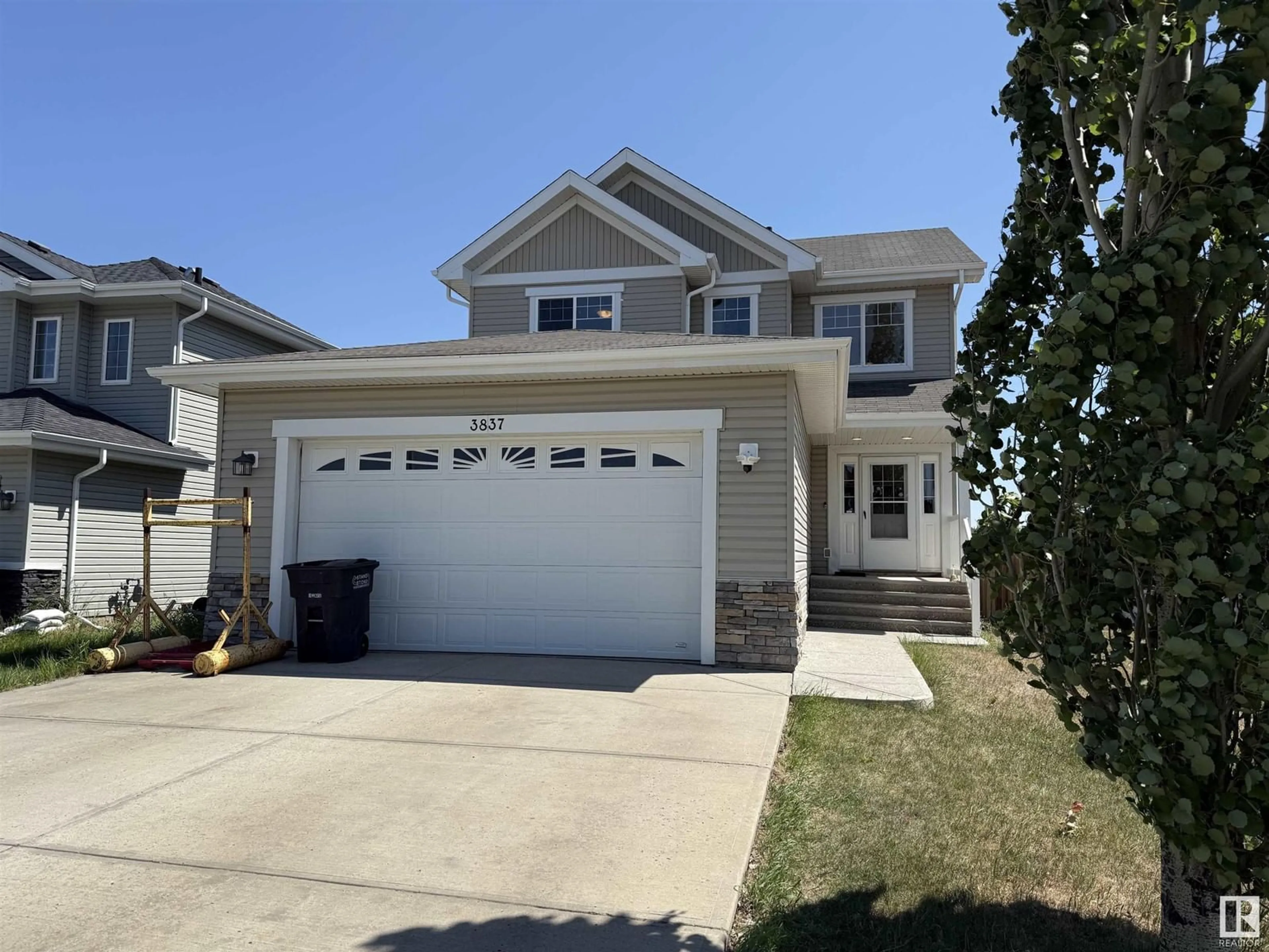 Home with vinyl exterior material, street for 3837 52 ST, Gibbons Alberta T0A1N0