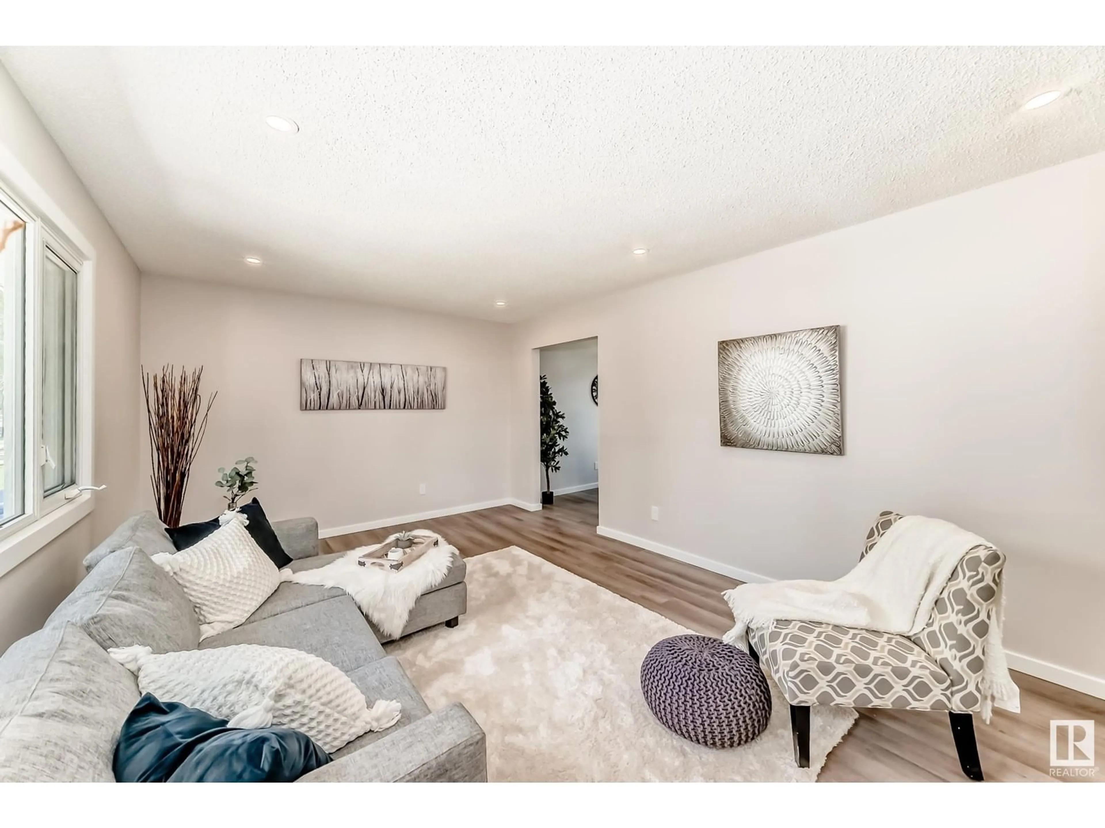 Living room with furniture, unknown for 6011 146 AV, Edmonton Alberta T5A1S9