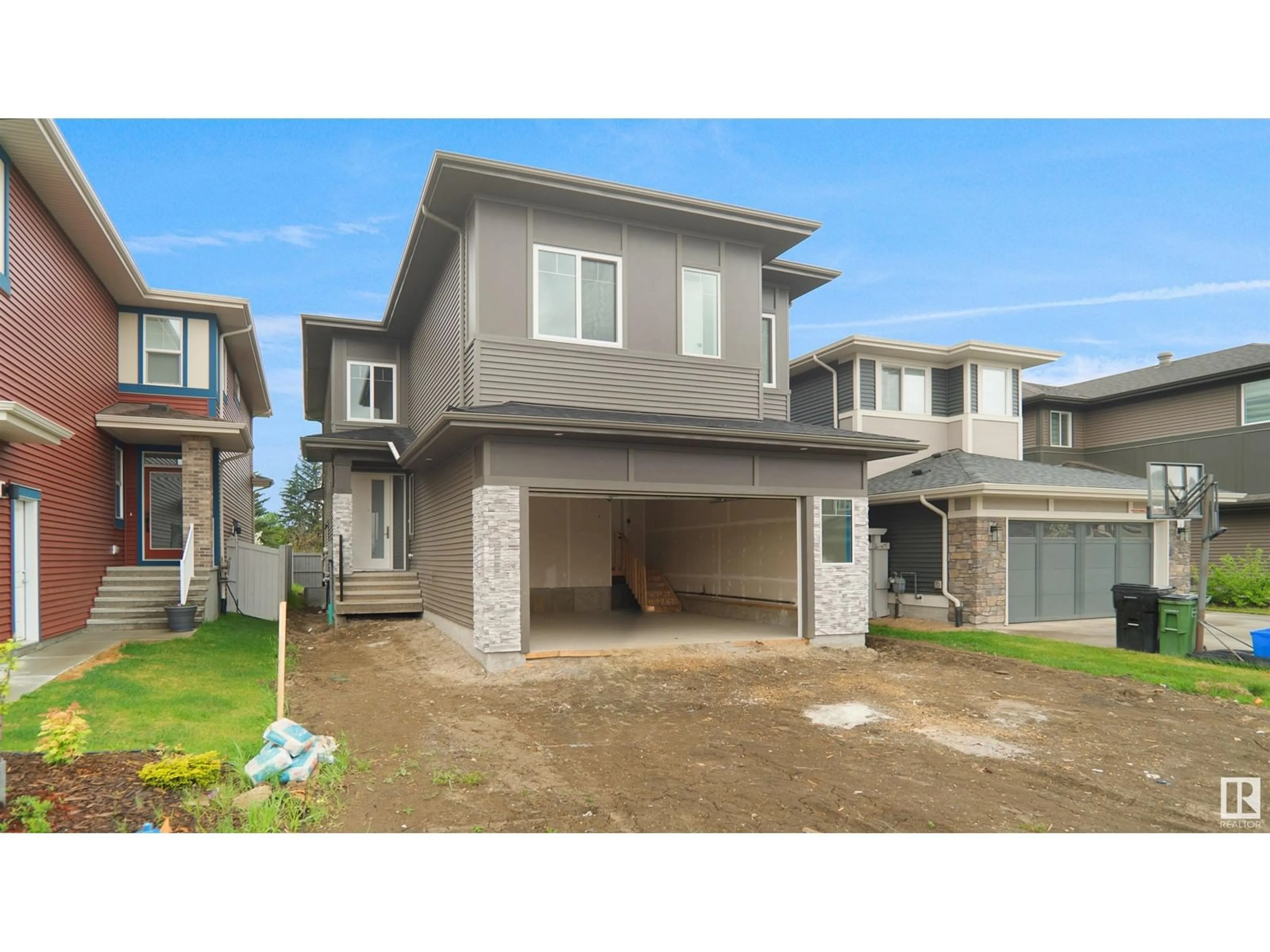 Home with vinyl exterior material, street for 6179 CARR RD, Edmonton Alberta T5E6Y5