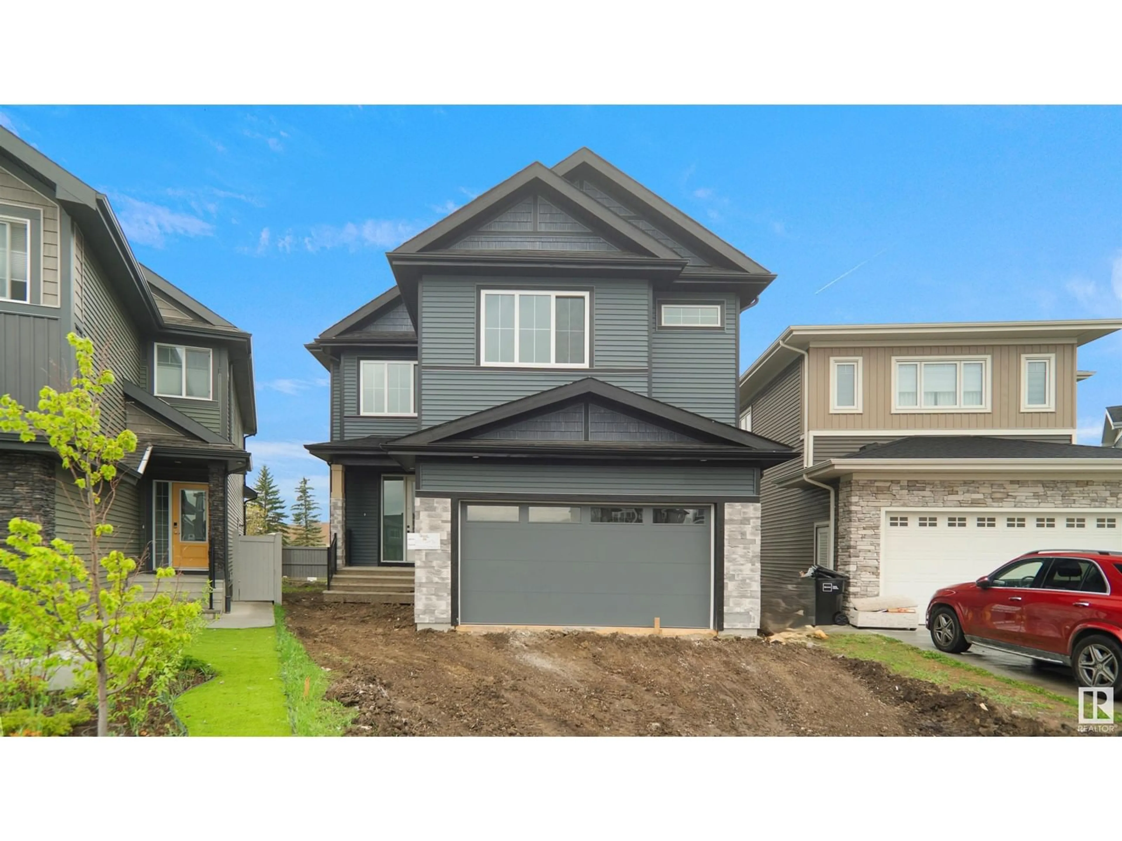 Home with vinyl exterior material, street for 6187 CARR RD, Edmonton Alberta T5E6Y5