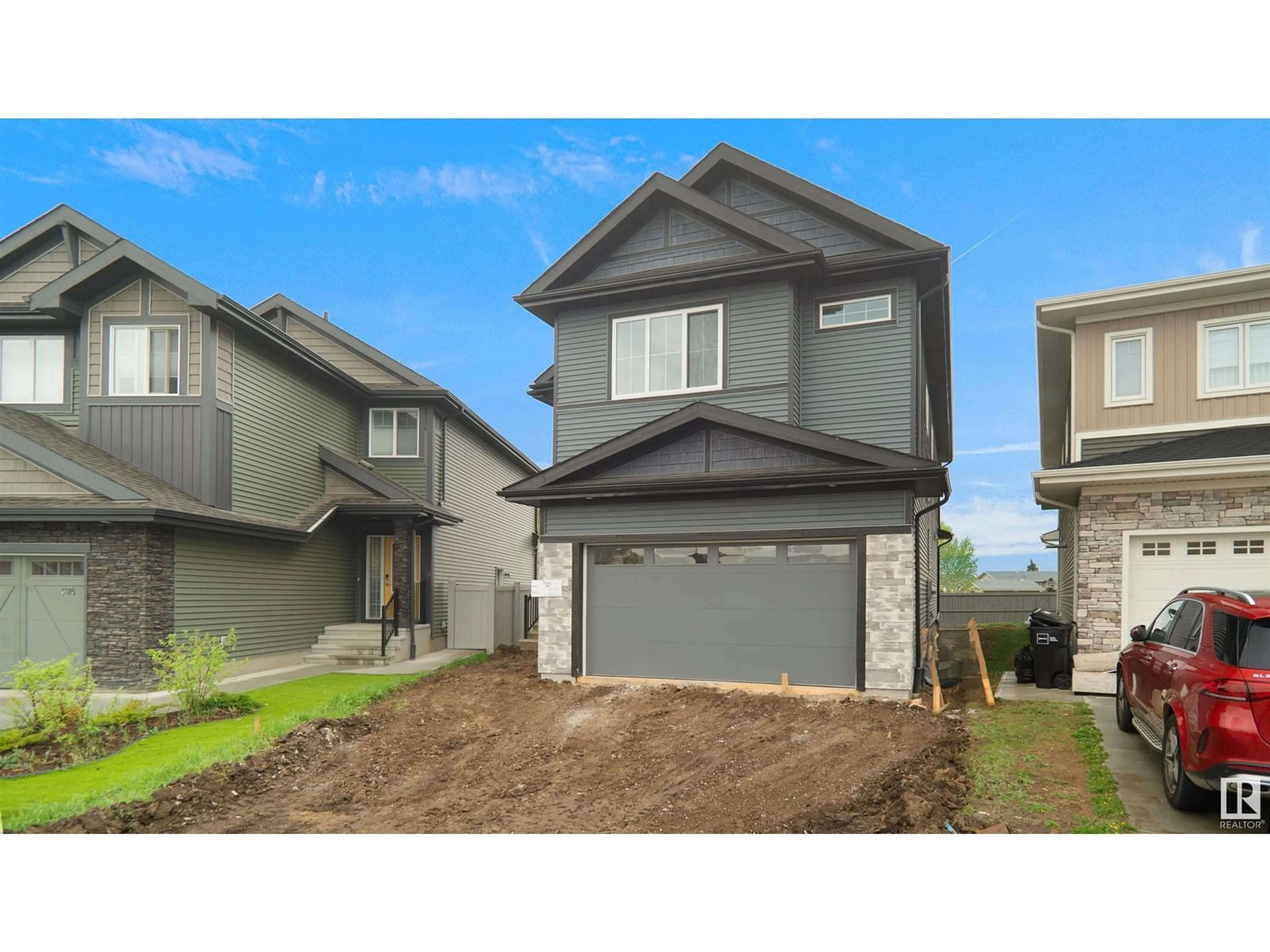 Home with vinyl exterior material, street for 6187 CARR RD, Edmonton Alberta T5E6Y5
