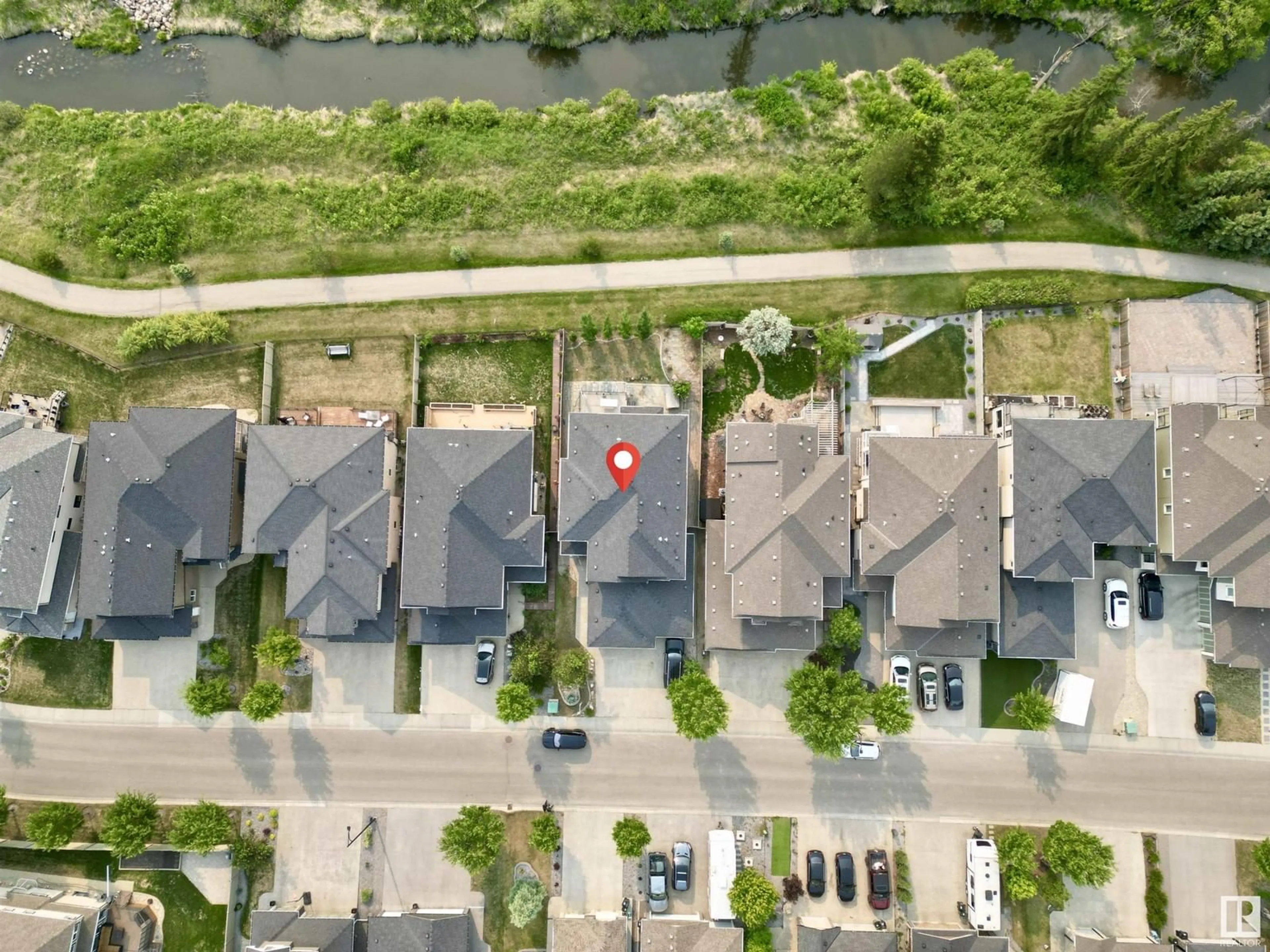 A pic from outside/outdoor area/front of a property/back of a property/a pic from drone, street for 1328 ADAMSON DR, Edmonton Alberta T6W1A8