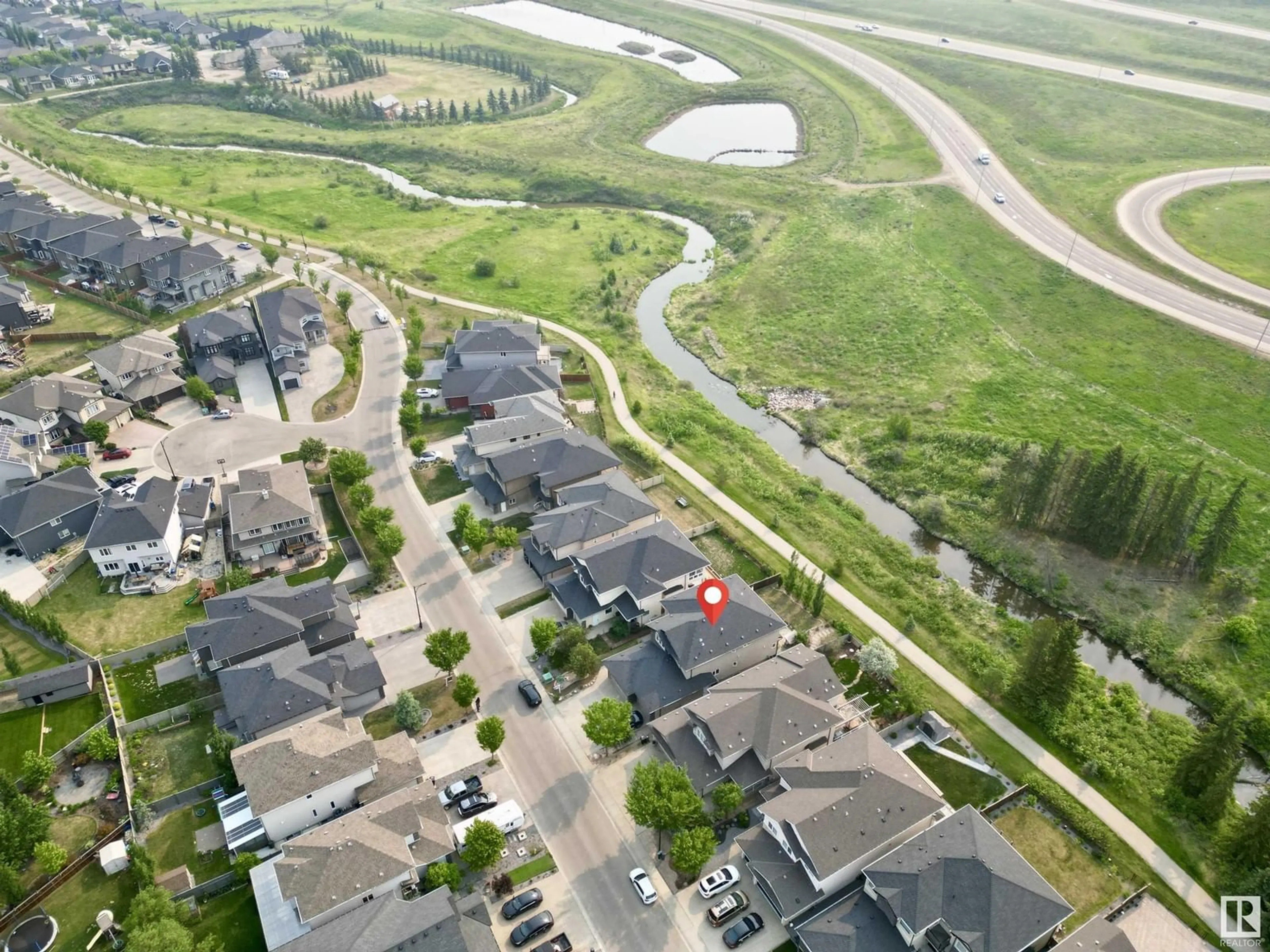 A pic from outside/outdoor area/front of a property/back of a property/a pic from drone, street for 1328 ADAMSON DR, Edmonton Alberta T6W1A8