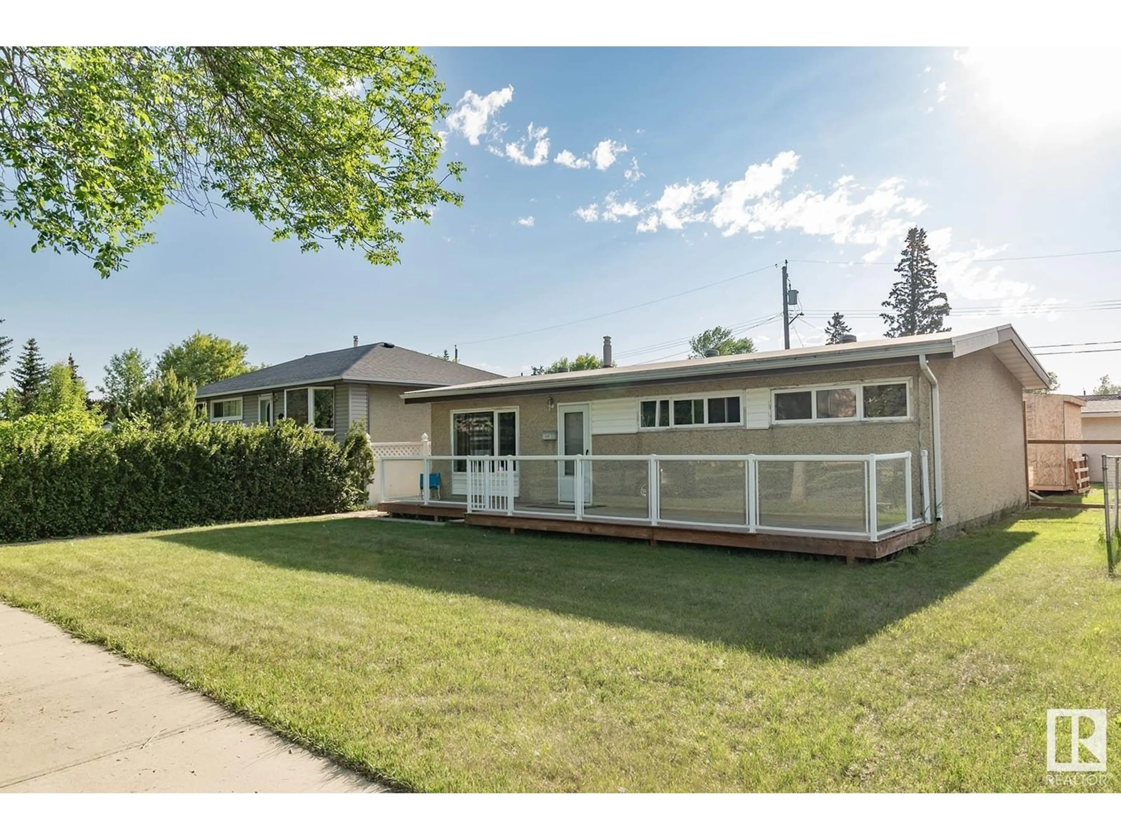 Home with vinyl exterior material, street for NW - 10941 159 ST, Edmonton Alberta T5P3B9
