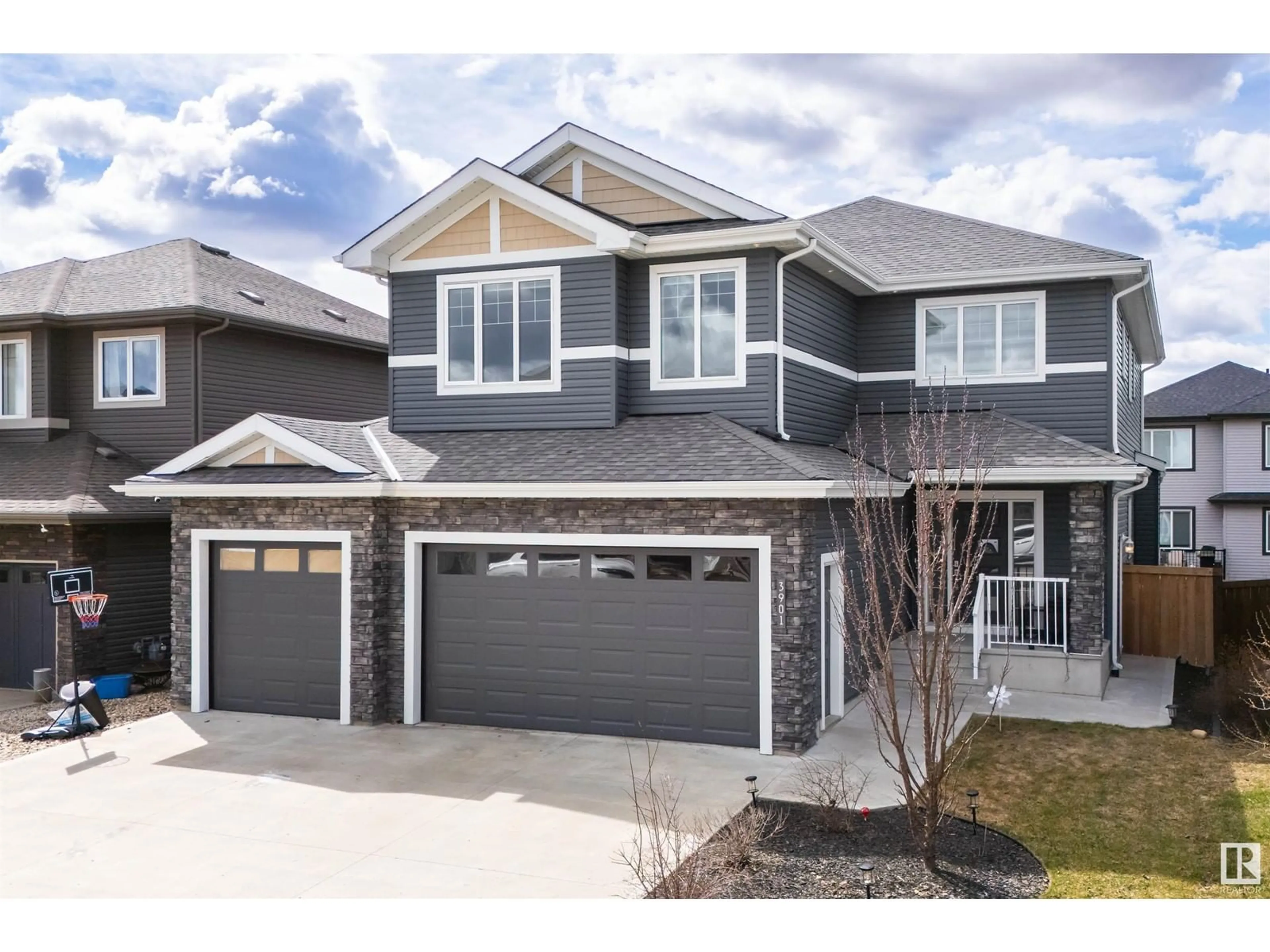 Home with vinyl exterior material, street for 3901 44 AV, Beaumont Alberta T4X2B7