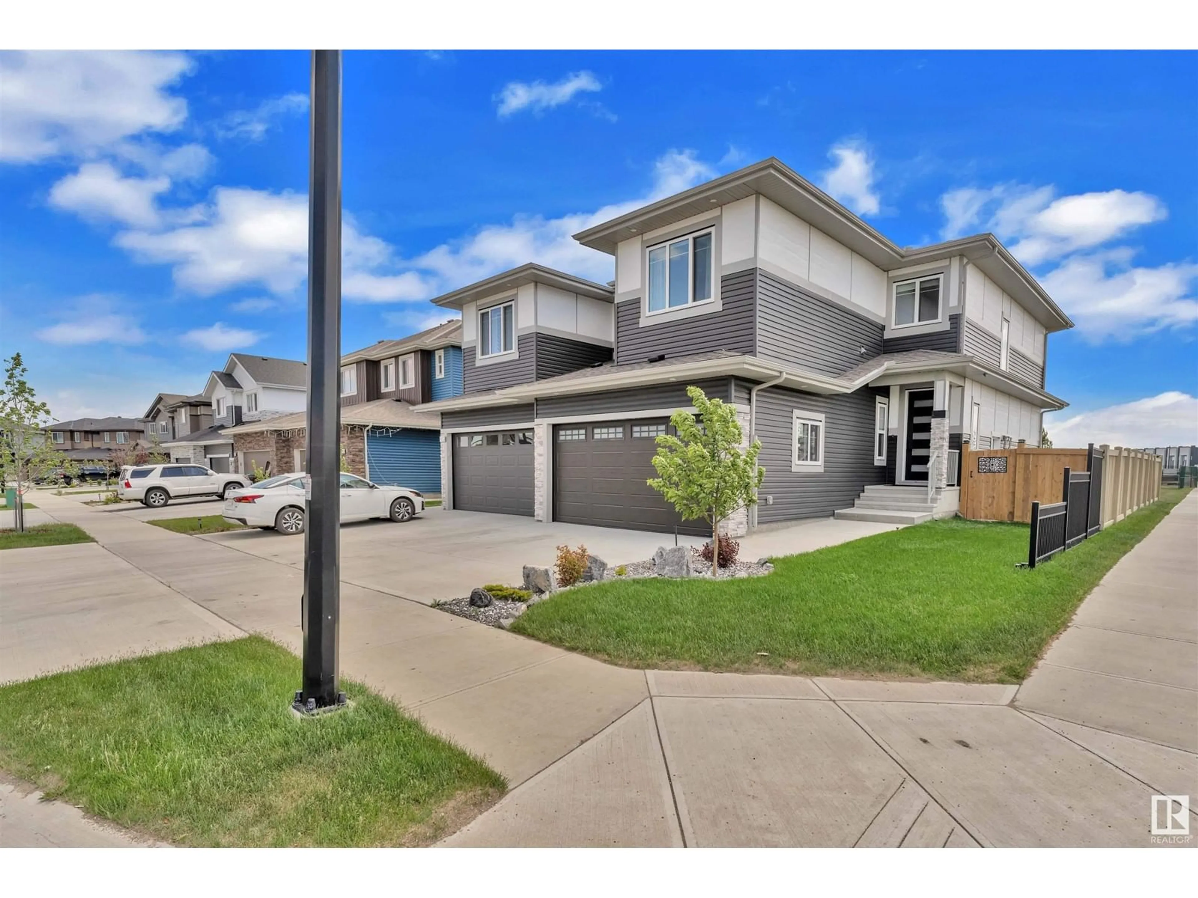 A pic from outside/outdoor area/front of a property/back of a property/a pic from drone, street for 1 ELKO BN, St. Albert Alberta T8N7Z9