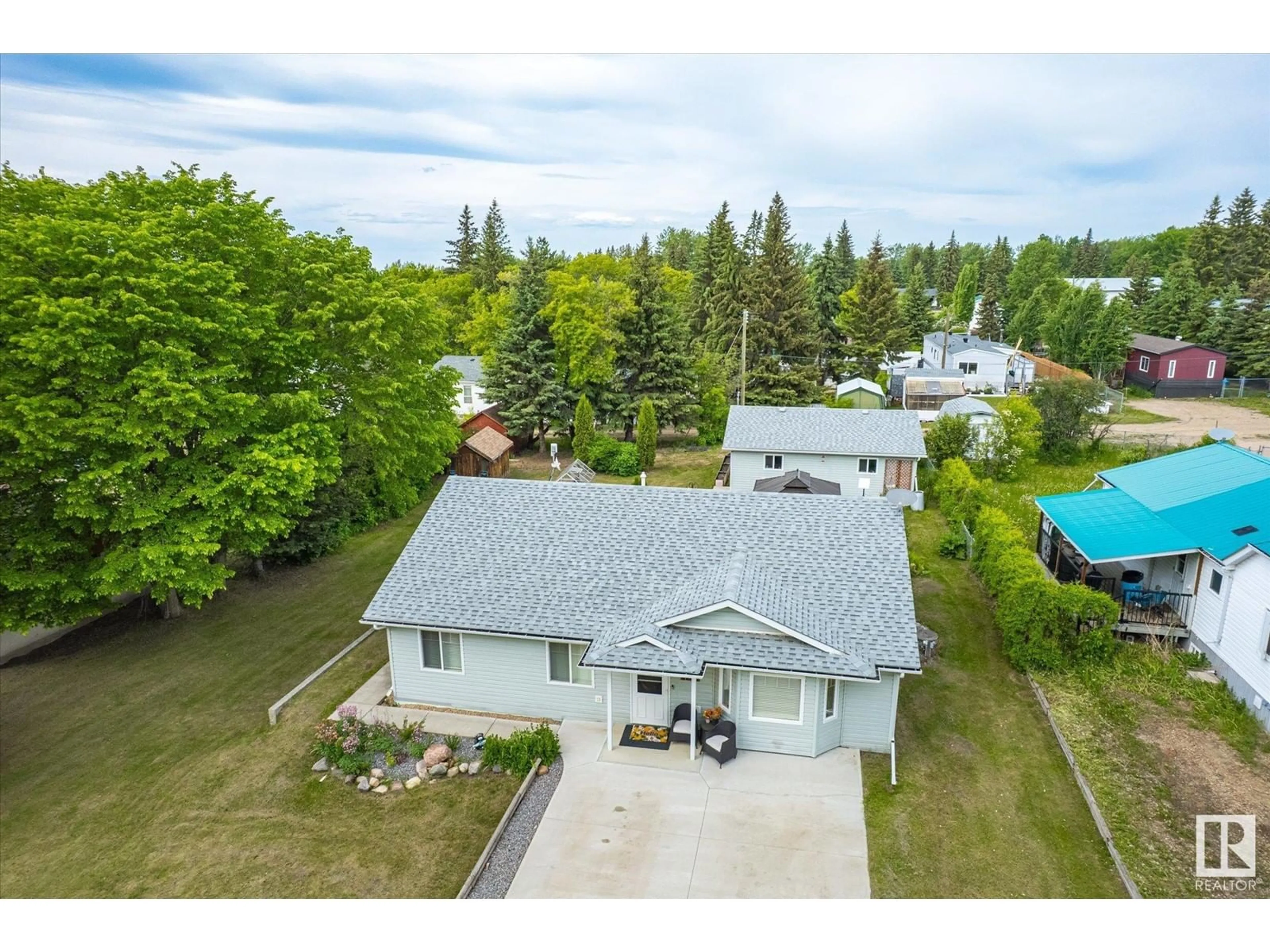 A pic from outside/outdoor area/front of a property/back of a property/a pic from drone, water/lake/river/ocean view for 5014 51 AV, Jarvie Alberta T0G1H0