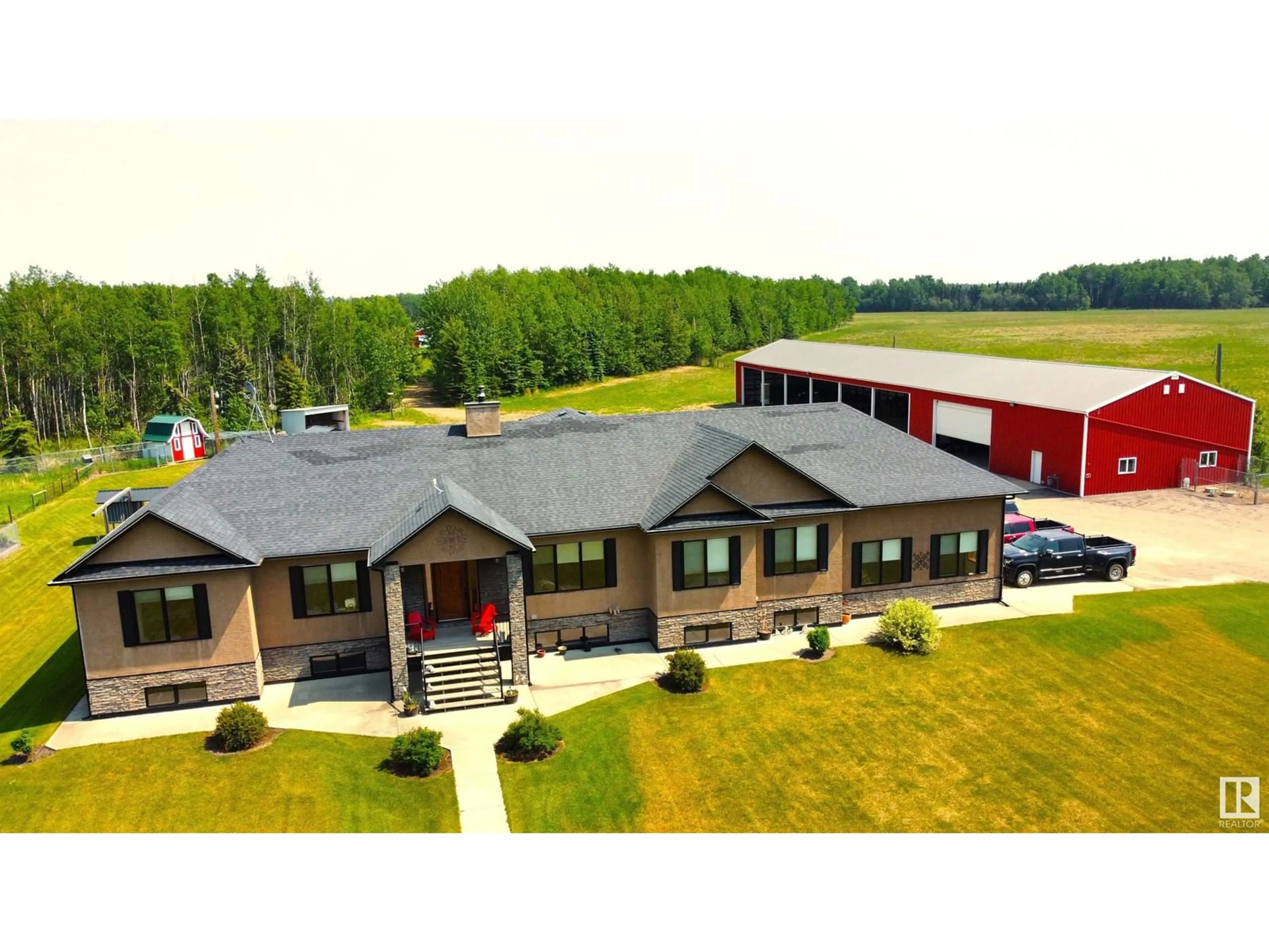 A pic from outside/outdoor area/front of a property/back of a property/a pic from drone, building for 665033 RGE RD 181, Rural Athabasca County Alberta T0A0E0