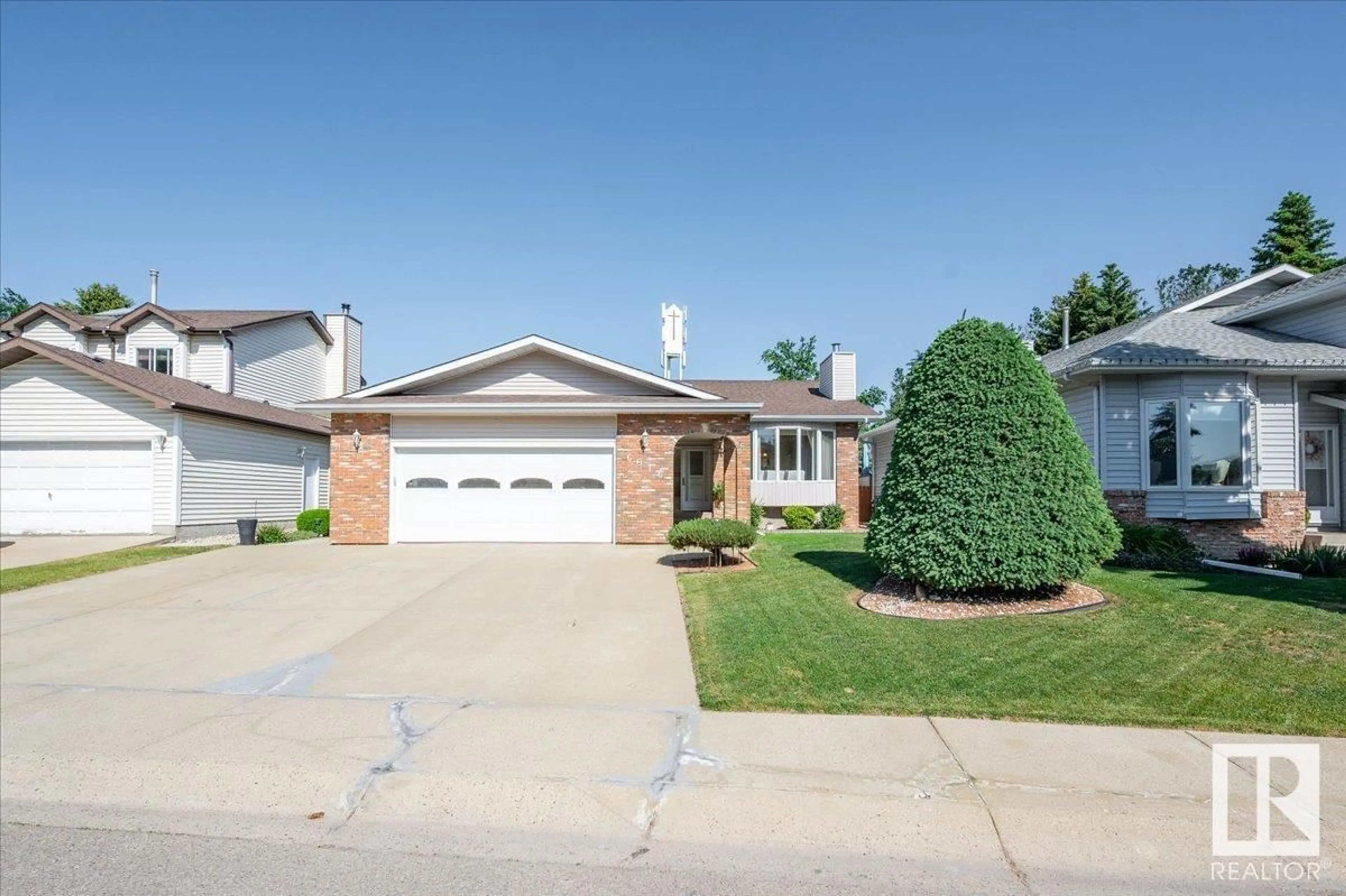 Home with vinyl exterior material, street for 6016 183 ST, Edmonton Alberta T6M1T8