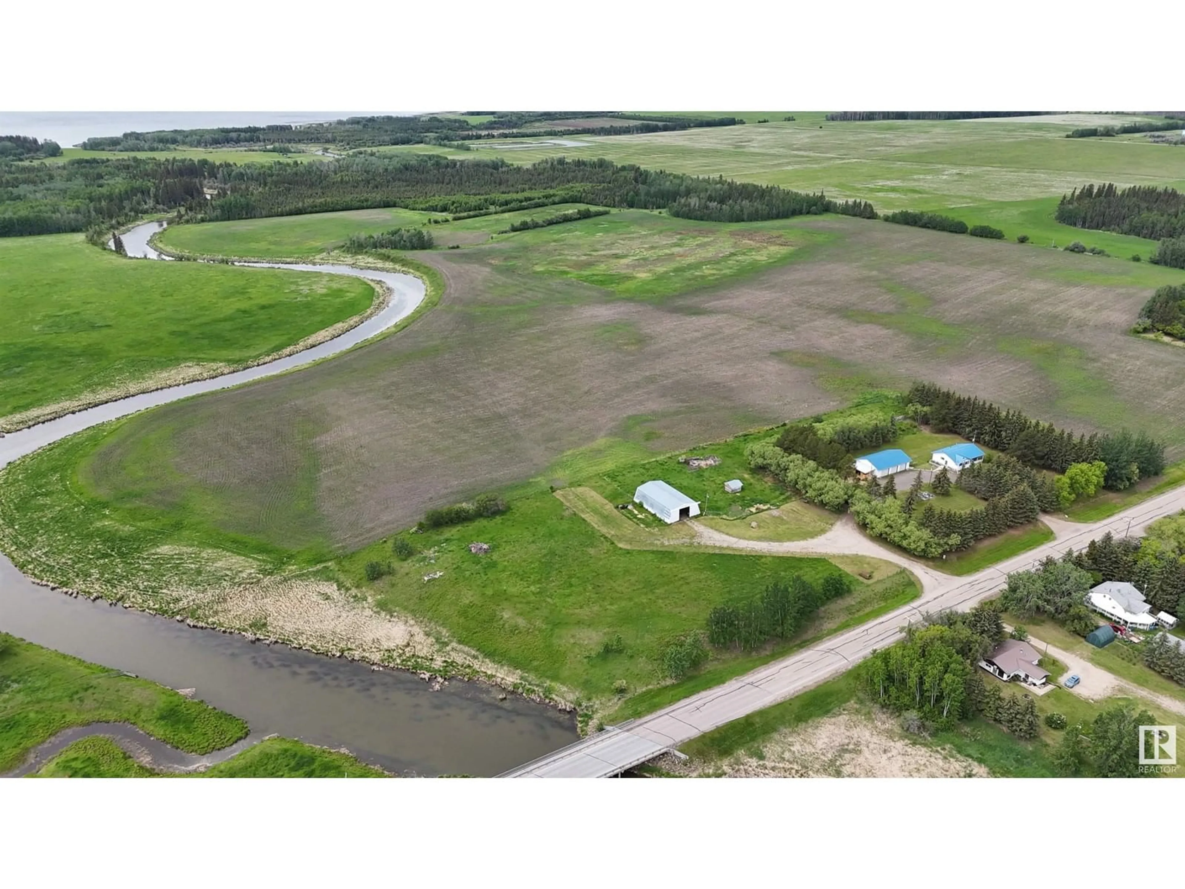 A pic from outside/outdoor area/front of a property/back of a property/a pic from drone, water/lake/river/ocean view for 53508 RANGE ROAD 92, Rural Yellowhead Alberta T0E2M0