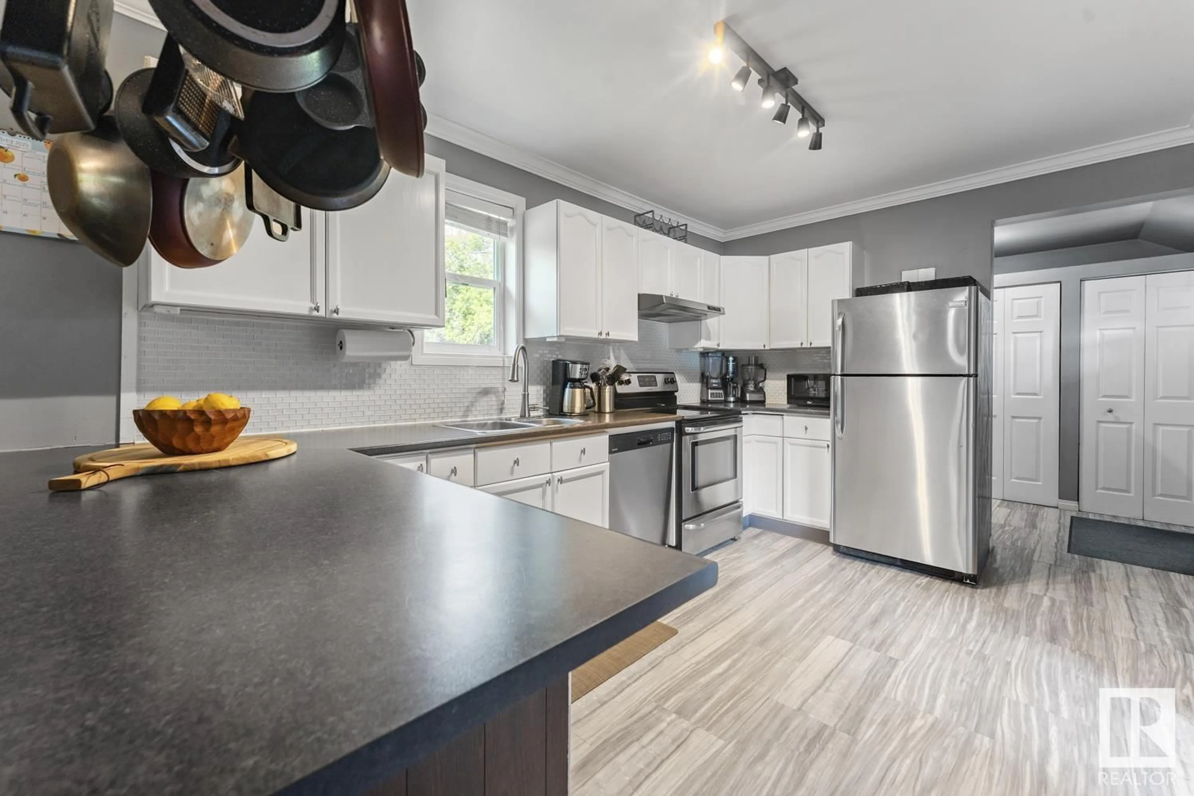 Open concept kitchen, wood/laminate floor for 5015 49 AV, Ardmore Alberta T0A0B0