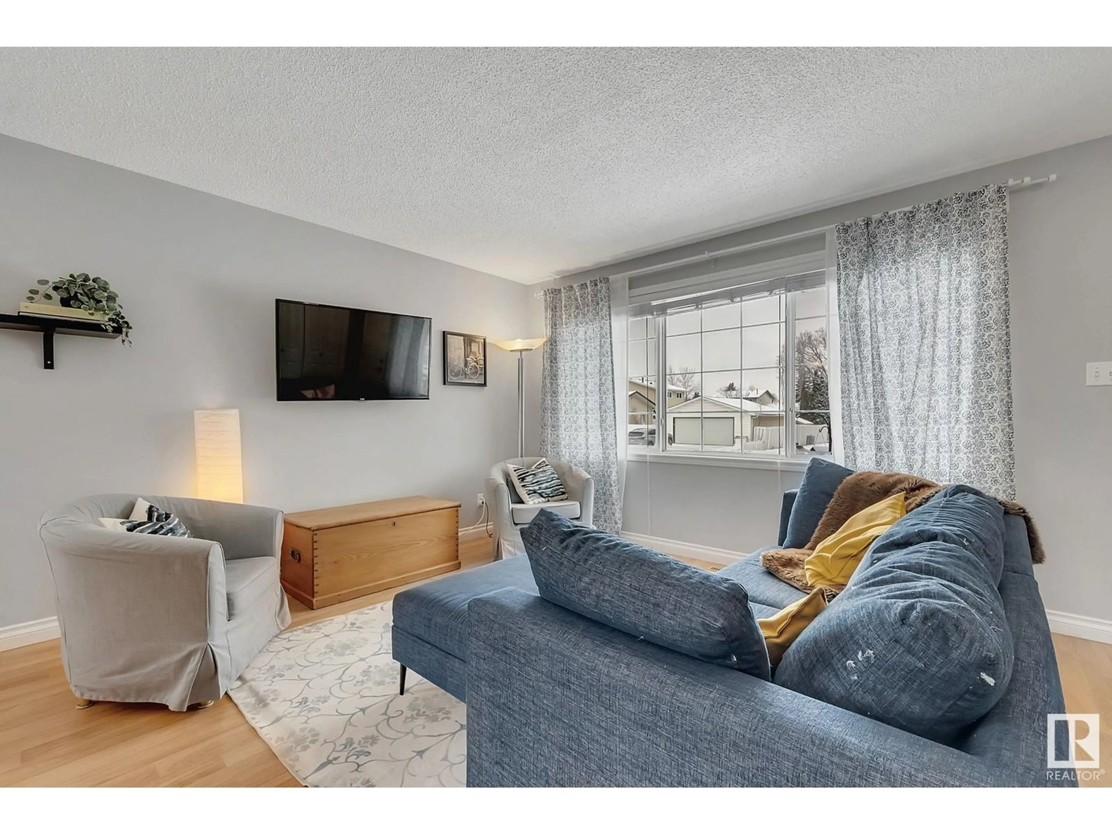 Living room with furniture, unknown for 3531 114 ST, Edmonton Alberta T6J1L7