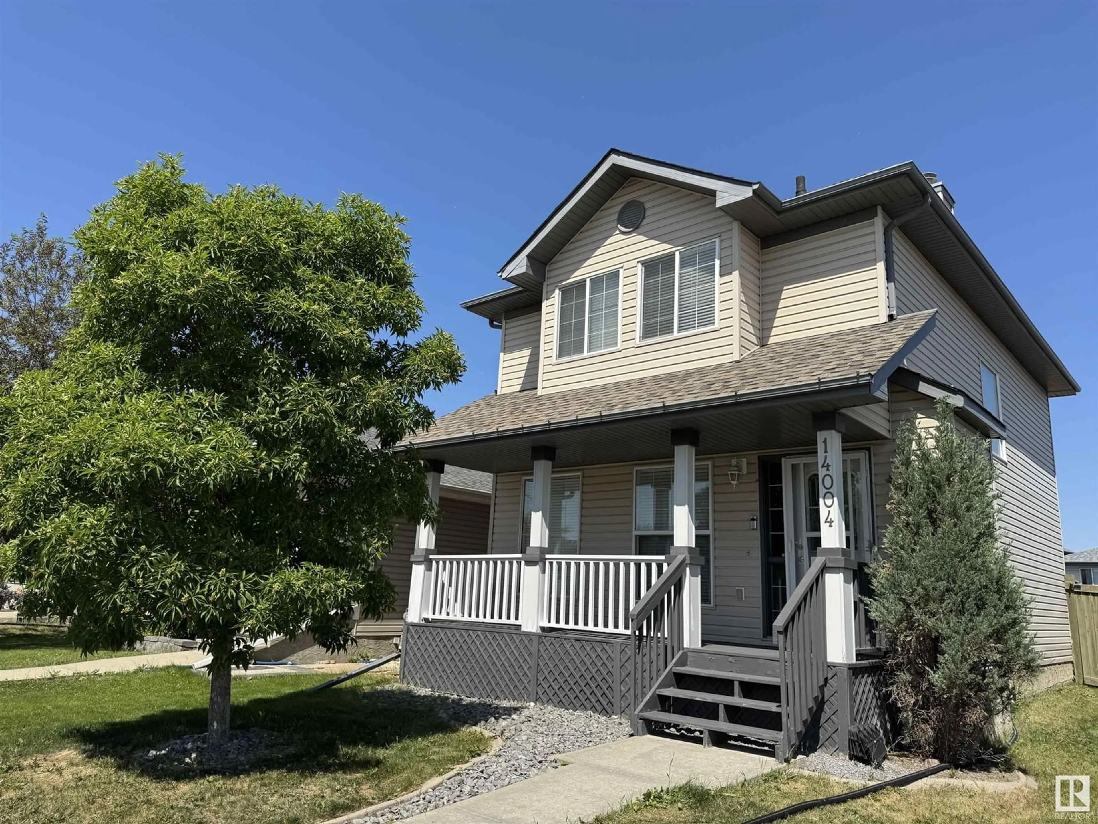 Home with vinyl exterior material, street for 14004 156 AV, Edmonton Alberta T6V1T3