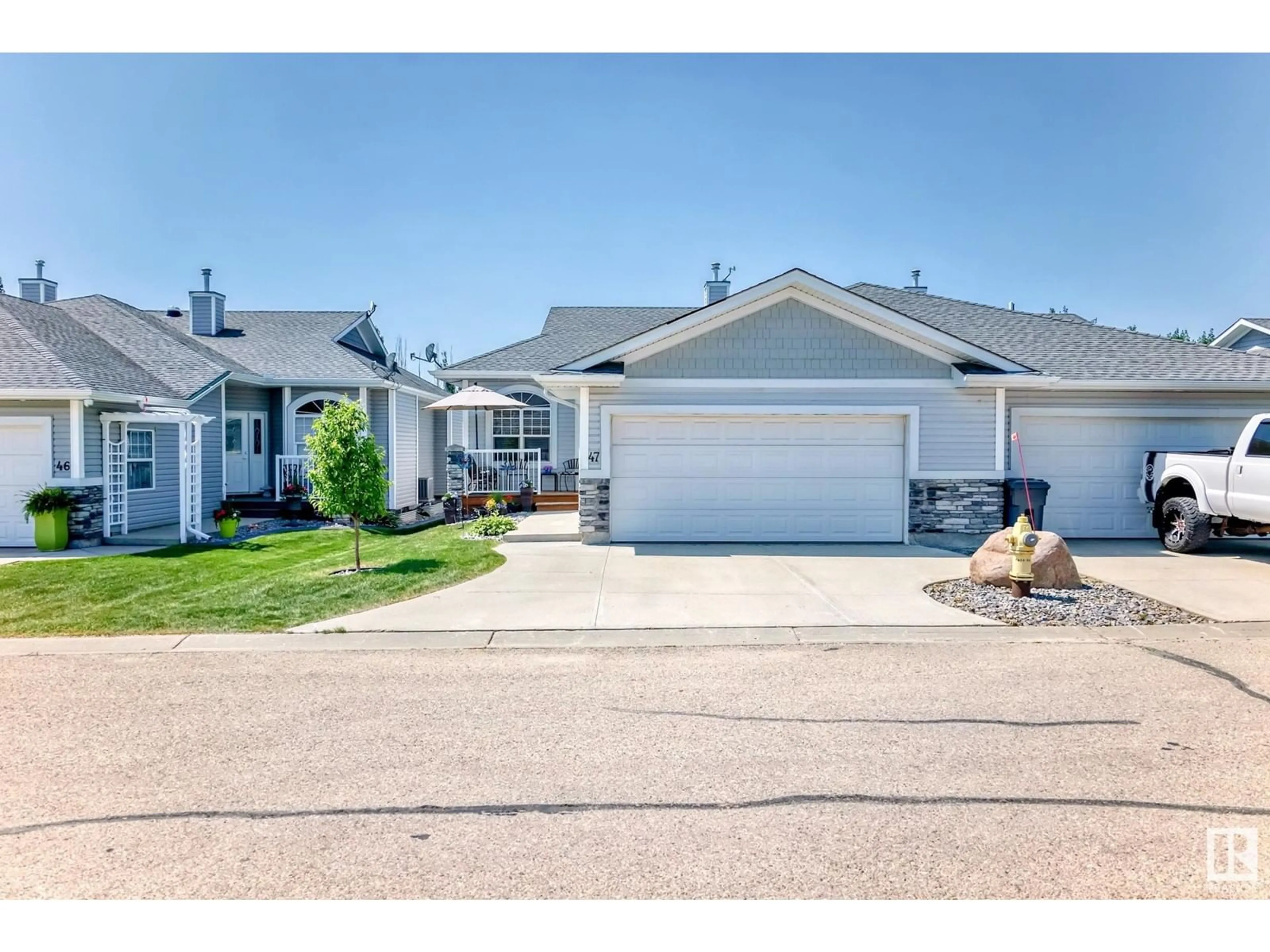 Home with vinyl exterior material, street for 47 - 26116A HGHWAY 16, Rural Parkland County Alberta T7Y1A1