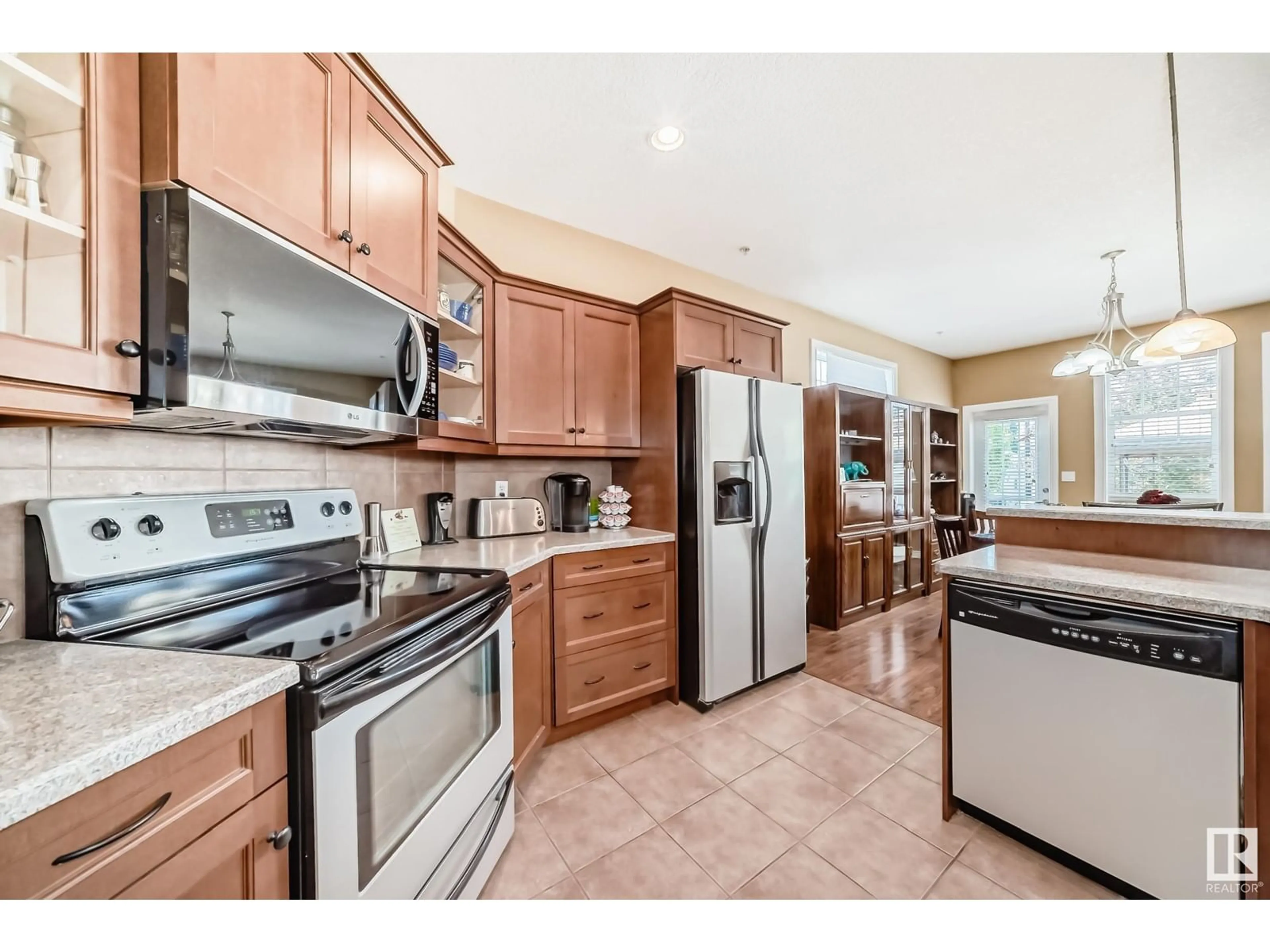 Open concept kitchen, ceramic/tile floor for 47 - 26116A HGHWAY 16, Rural Parkland County Alberta T7Y1A1