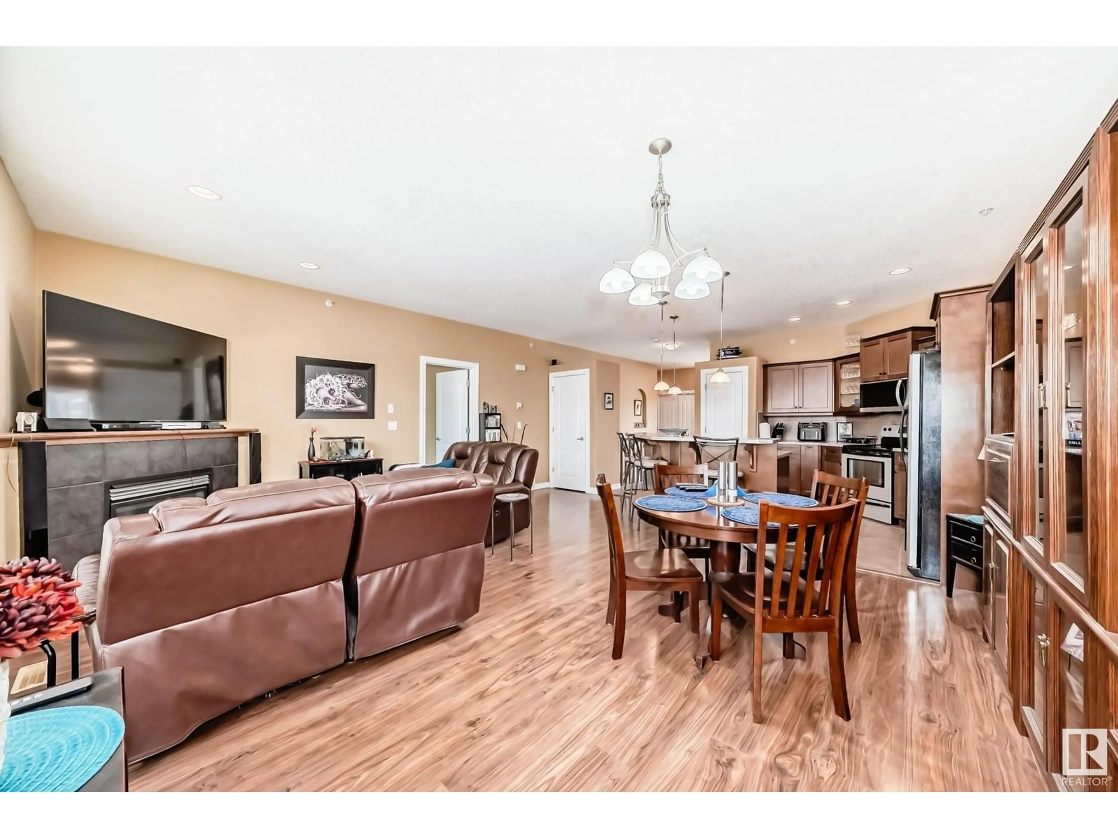 Open concept kitchen, wood/laminate floor for 47 - 26116A HGHWAY 16, Rural Parkland County Alberta T7Y1A1