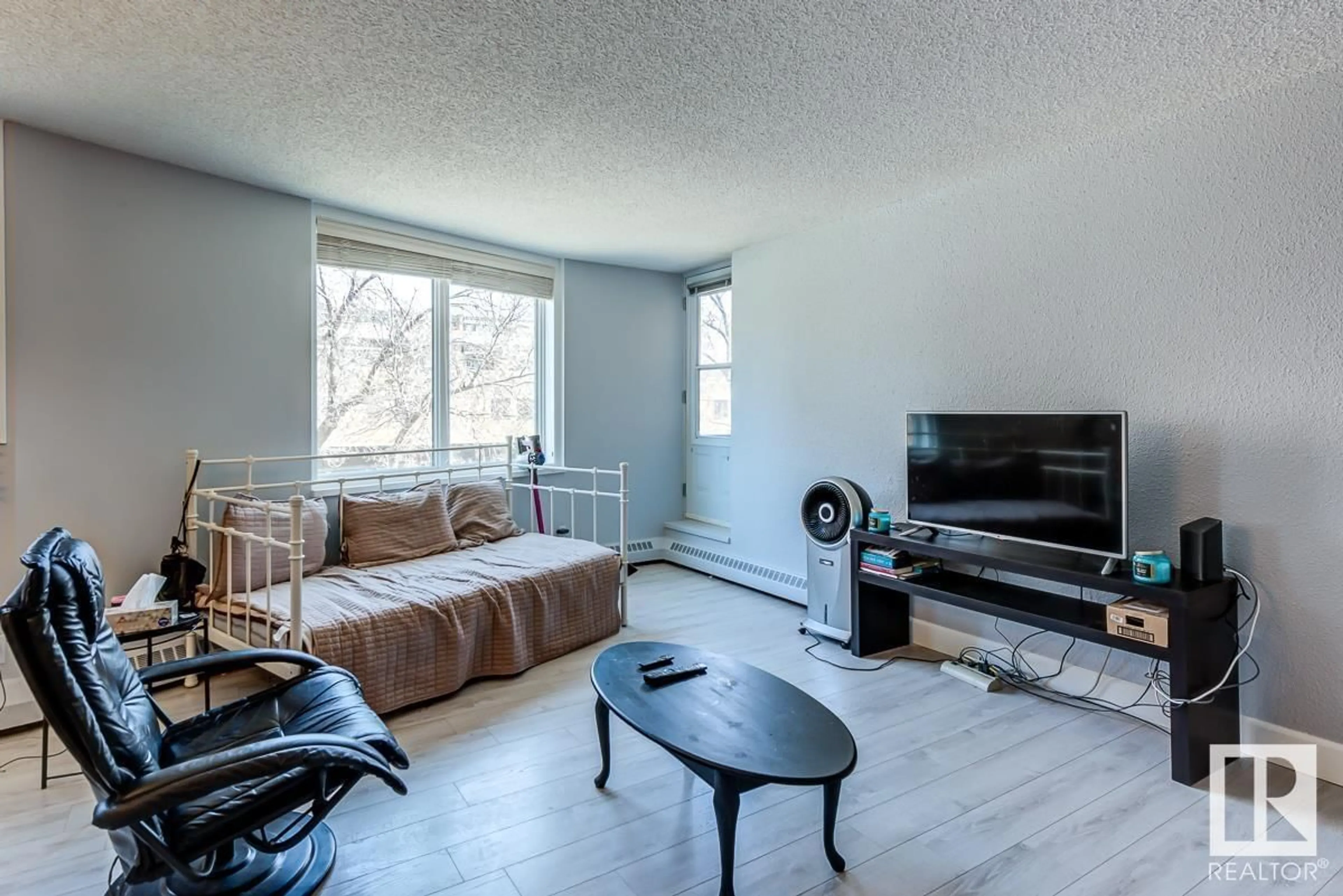 Living room with furniture, wood/laminate floor for #302 - 9916 113 ST, Edmonton Alberta T5K2N3