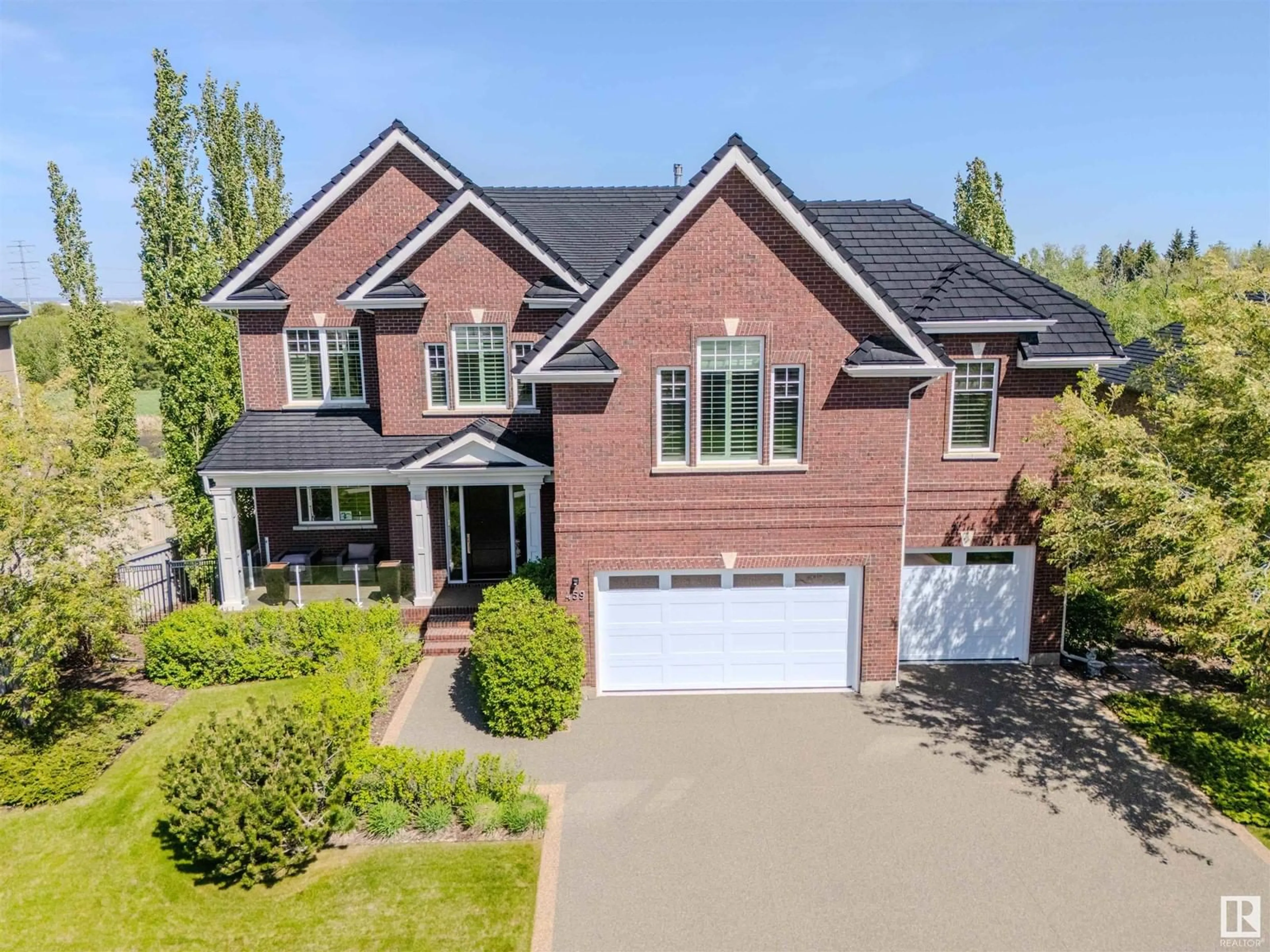 Home with brick exterior material, street for 52328 - 459 RGE ROAD 233, Rural Strathcona County Alberta T8B0A2