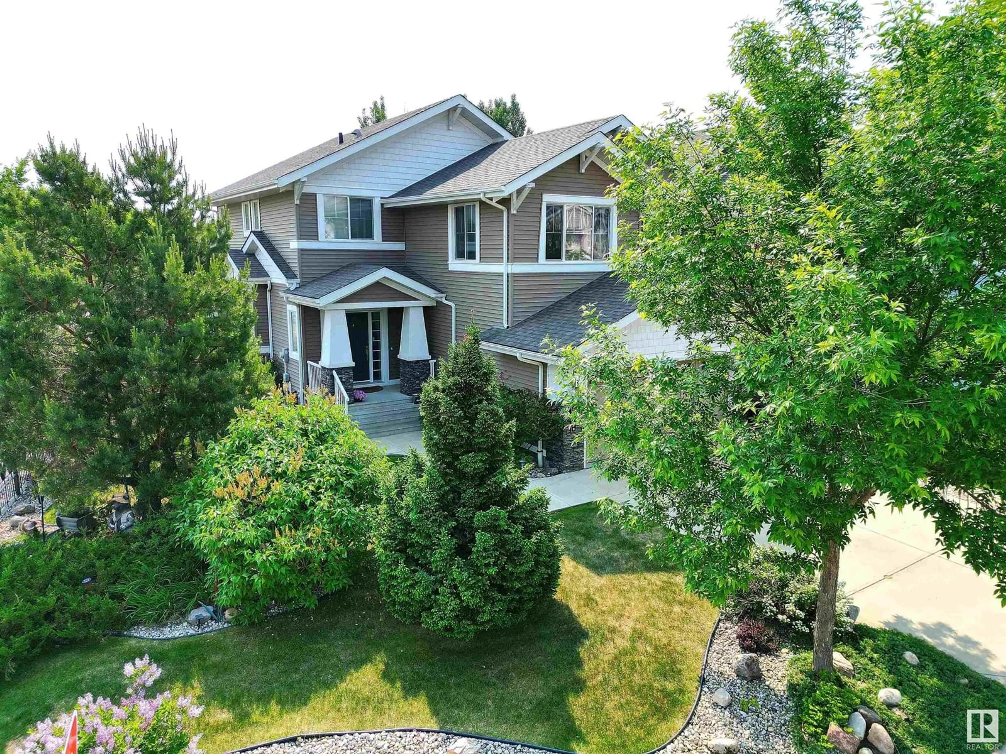 A pic from outside/outdoor area/front of a property/back of a property/a pic from drone, unknown for NW - 4919 213 ST, Edmonton Alberta T6M0G9