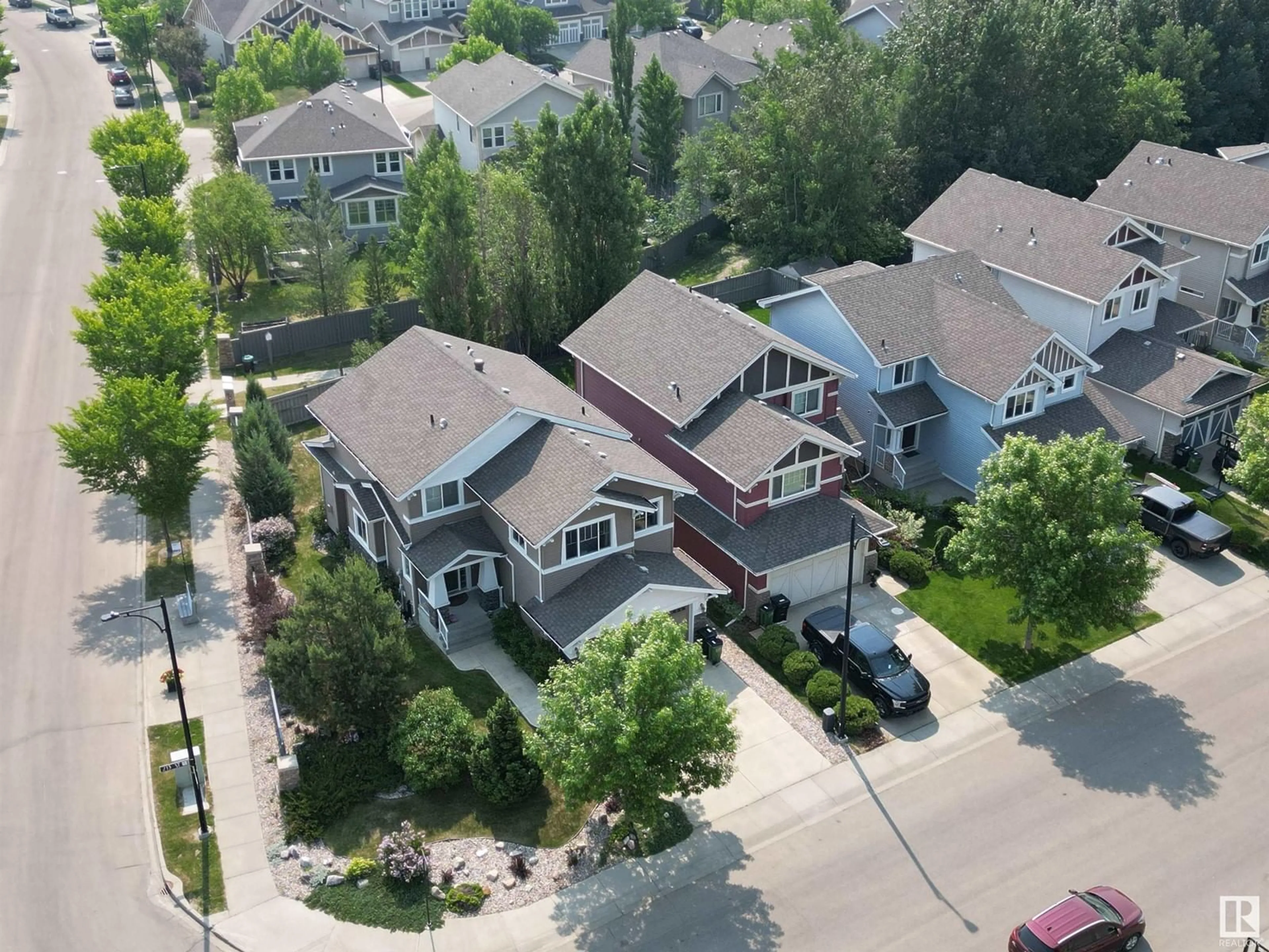 A pic from outside/outdoor area/front of a property/back of a property/a pic from drone, street for NW - 4919 213 ST, Edmonton Alberta T6M0G9