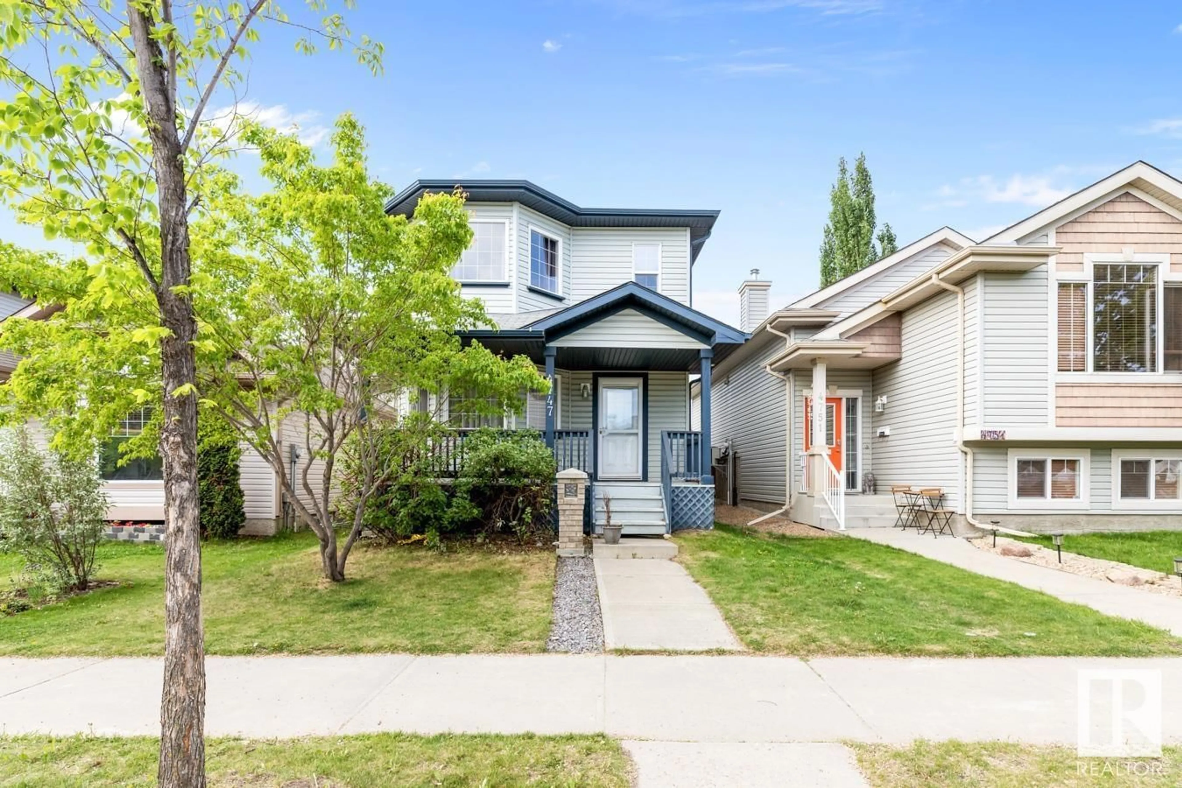 Home with vinyl exterior material, street for 4747 156 AV, Edmonton Alberta T5Y0B6