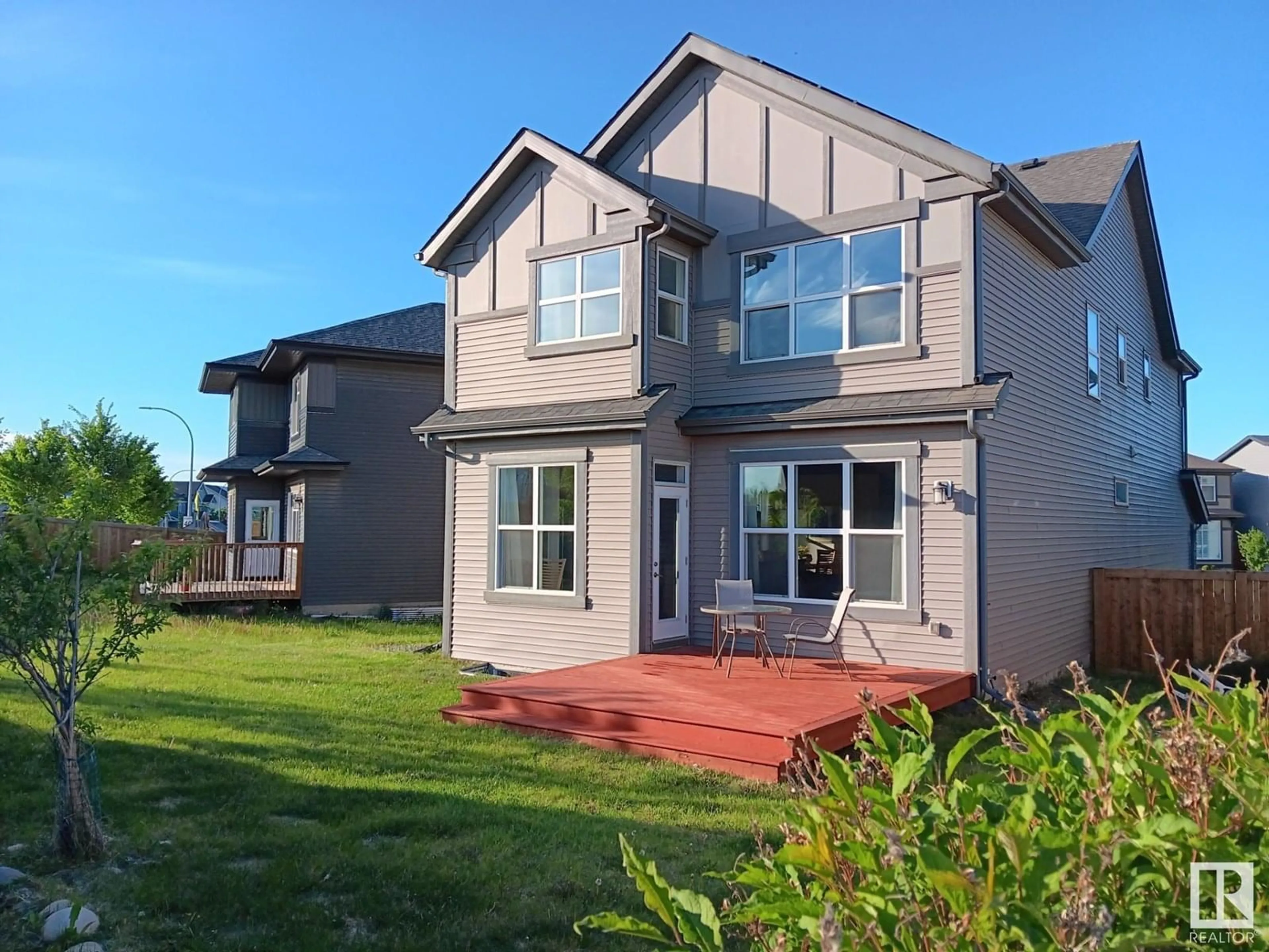 Home with vinyl exterior material, street for 9212 224 ST, Edmonton Alberta T5T7L9
