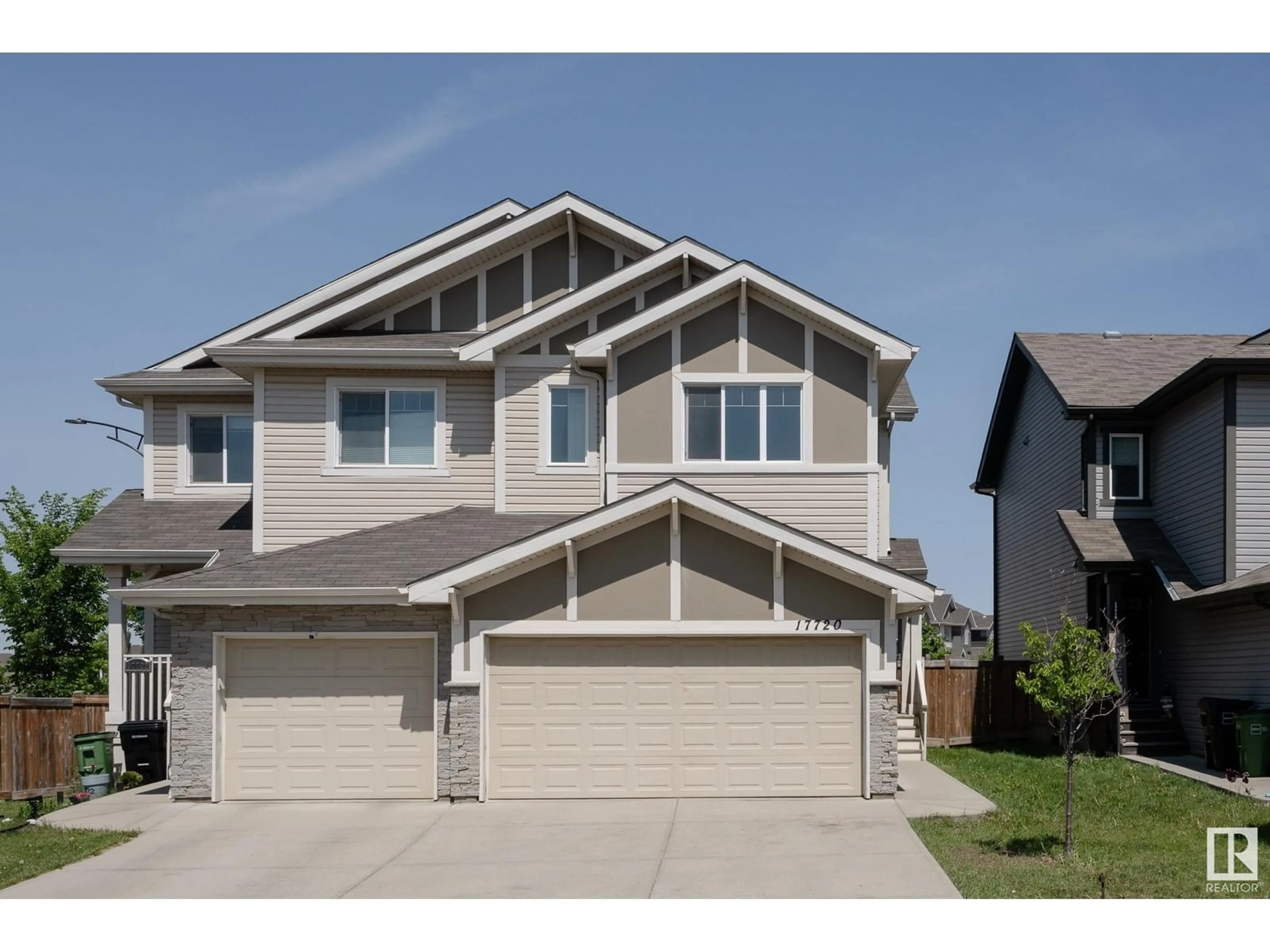 Home with vinyl exterior material, street for 17720 8 AV, Edmonton Alberta T6W2S6