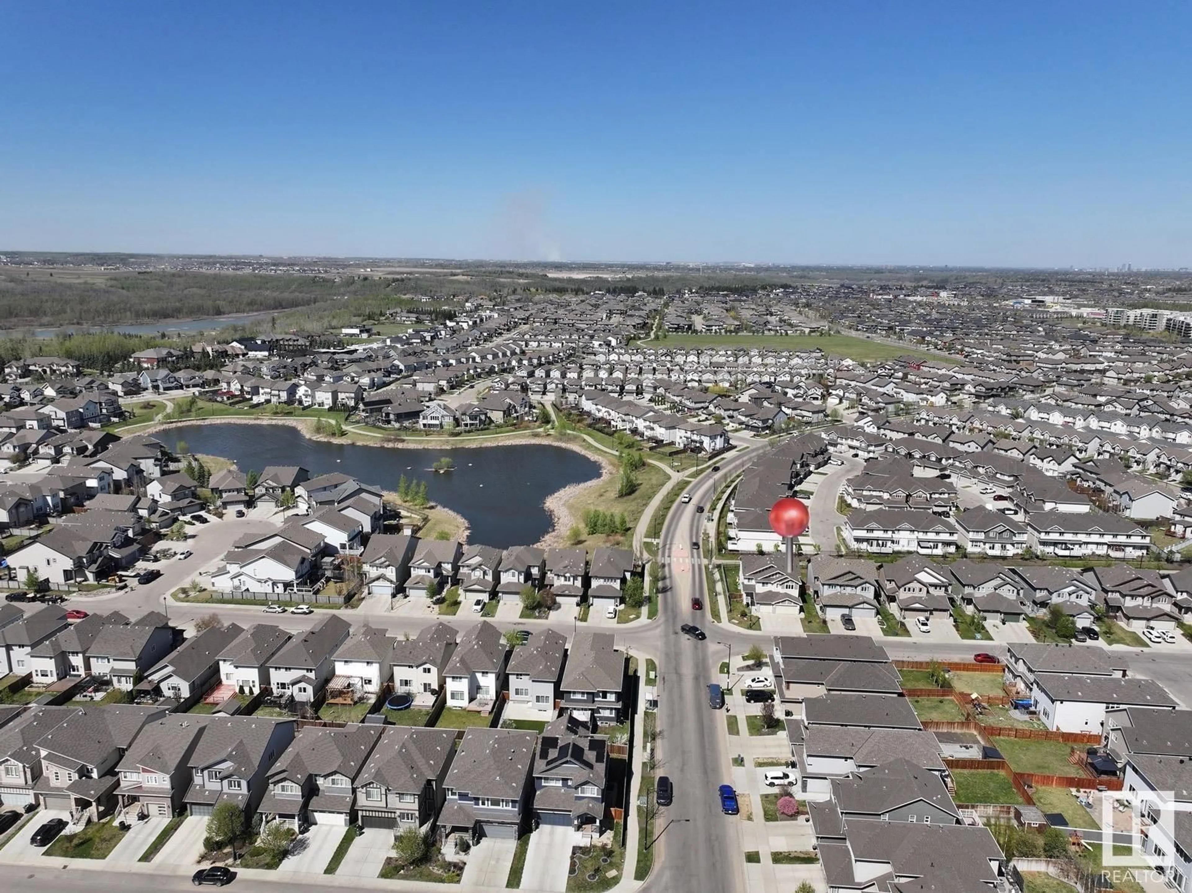 A pic from outside/outdoor area/front of a property/back of a property/a pic from drone, water/lake/river/ocean view for 17720 8 AV, Edmonton Alberta T6W2S6