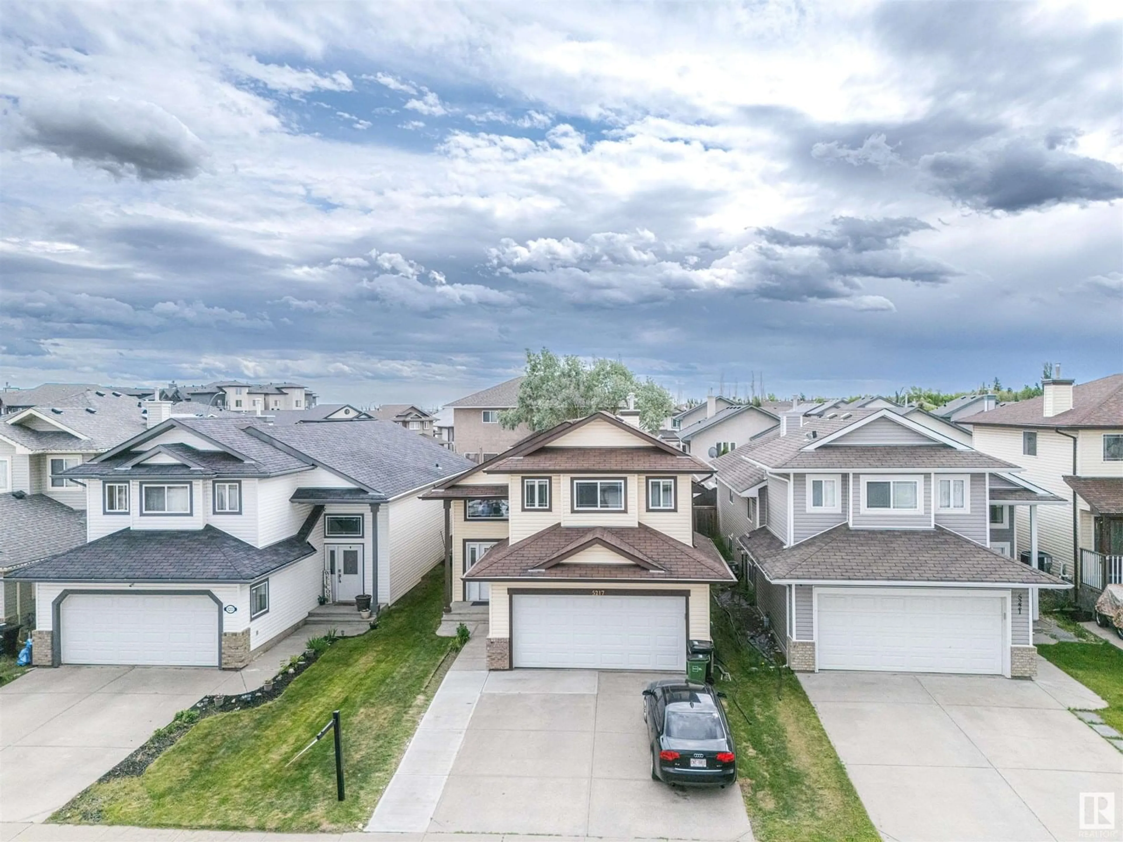 A pic from outside/outdoor area/front of a property/back of a property/a pic from drone, street for 5217 162A AV, Edmonton Alberta T5Y3C8