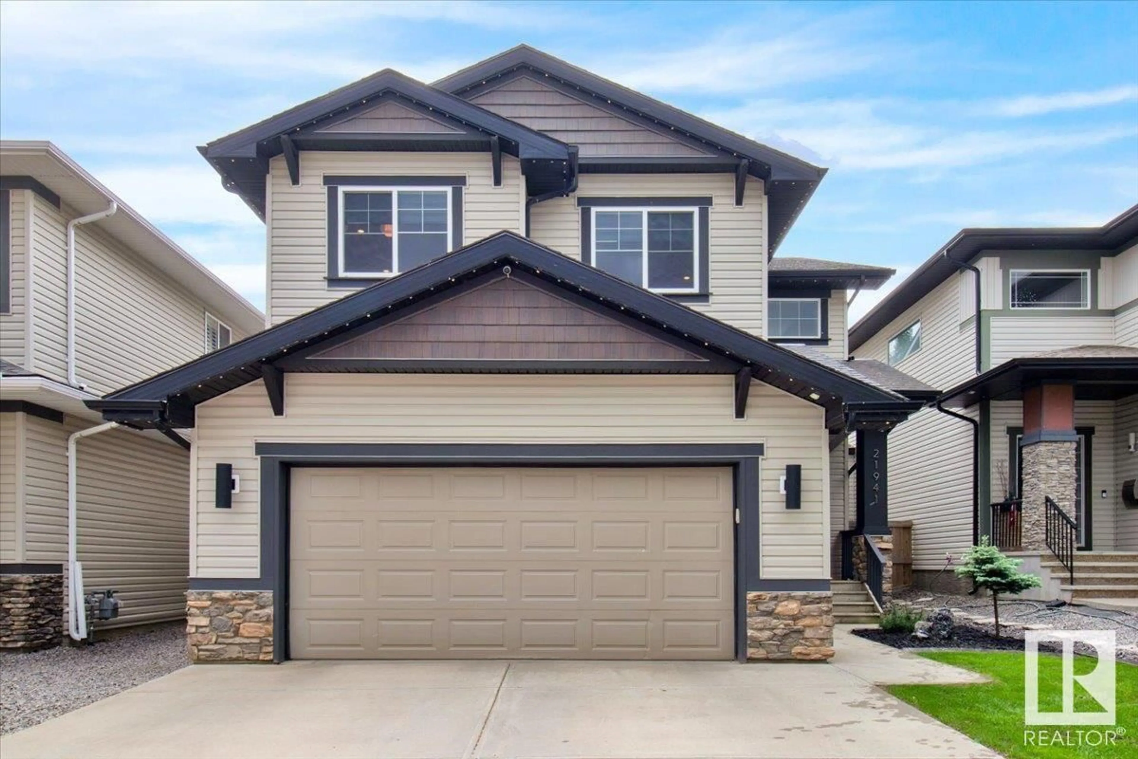 Home with vinyl exterior material, street for 21941 94A AV, Edmonton Alberta T5T1N1