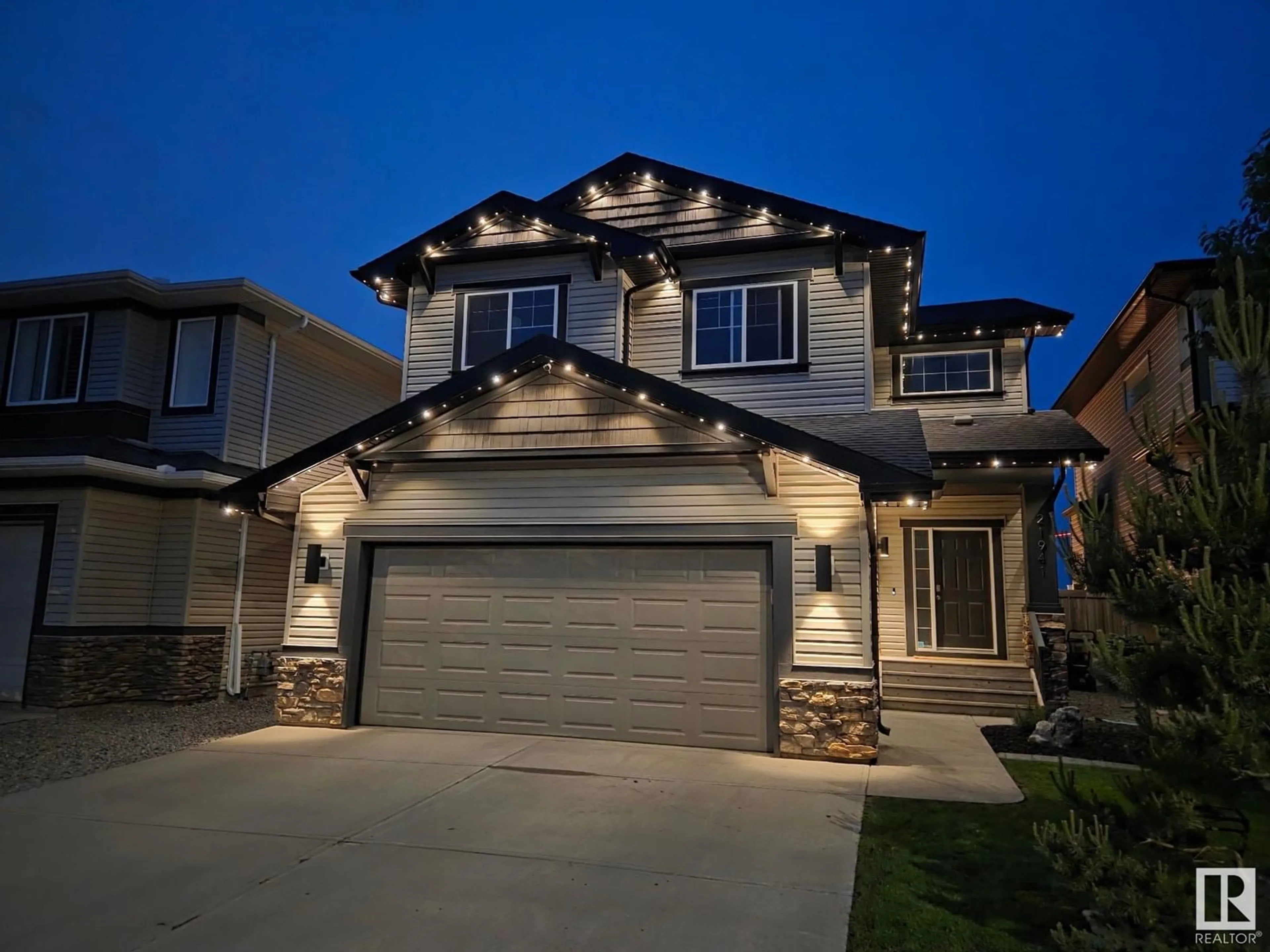Home with vinyl exterior material, street for 21941 94A AV, Edmonton Alberta T5T1N1