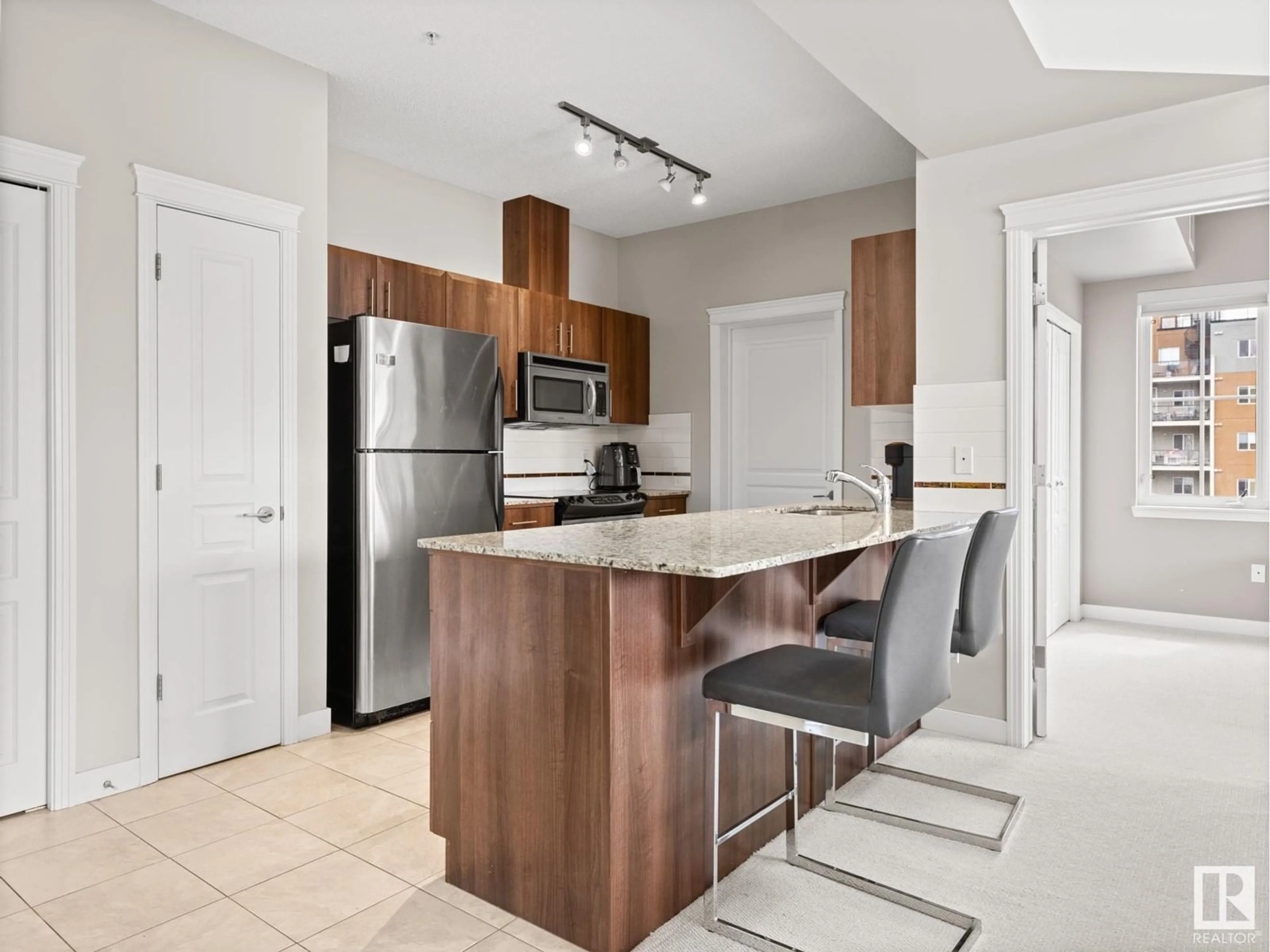 Open concept kitchen, unknown for 421 10333 112 ST NW, Edmonton Alberta T5K0B4