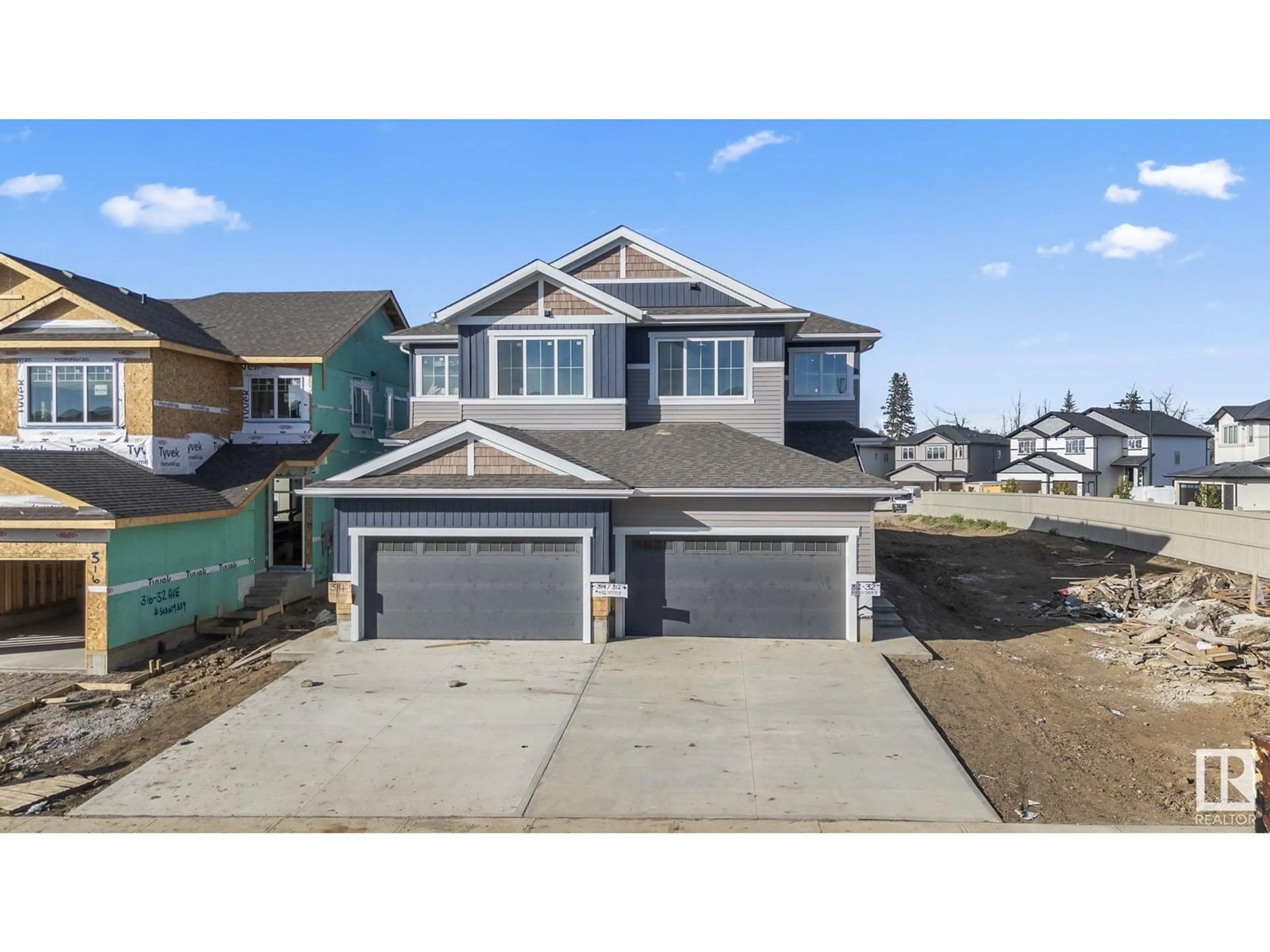 Home with vinyl exterior material, street for 324 32 AV, Edmonton Alberta T6T2K2
