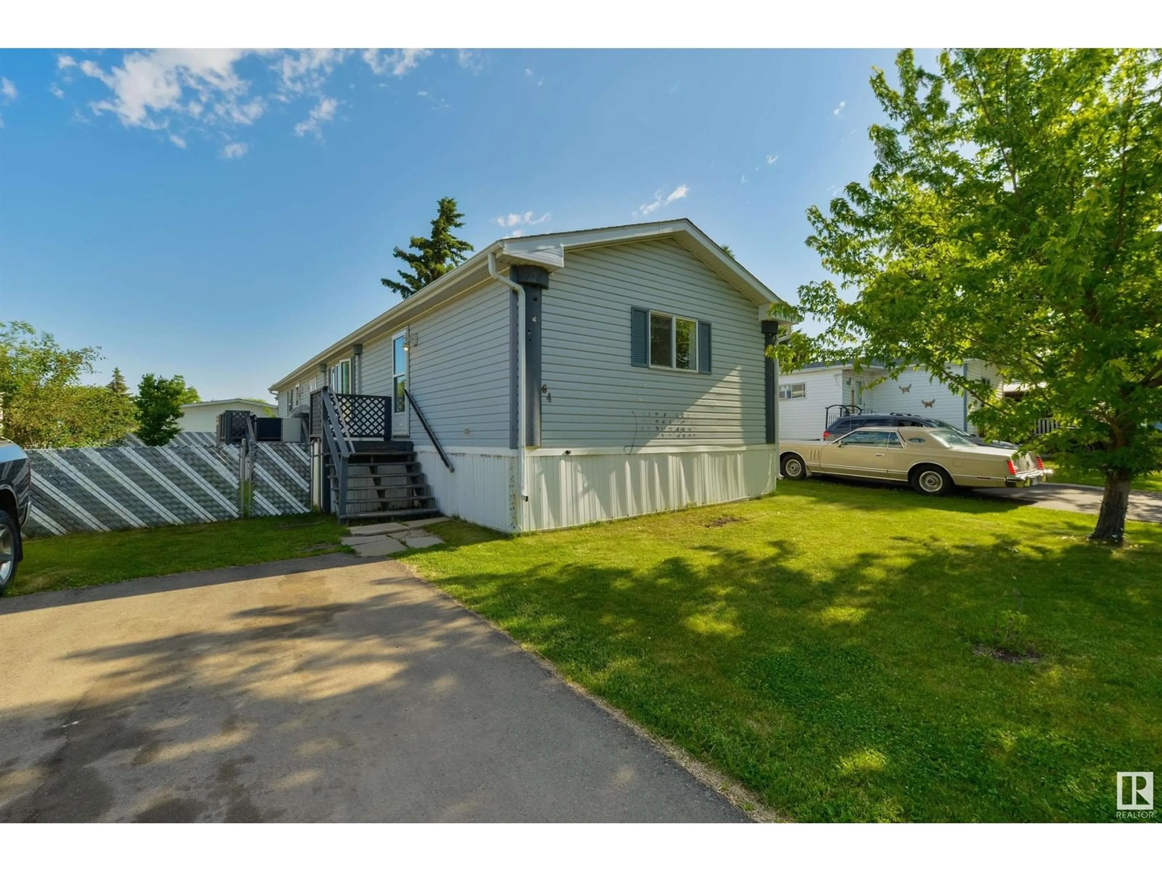 A pic from outside/outdoor area/front of a property/back of a property/a pic from drone, street for 64 RIM RD, Edmonton Alberta T6P1C2