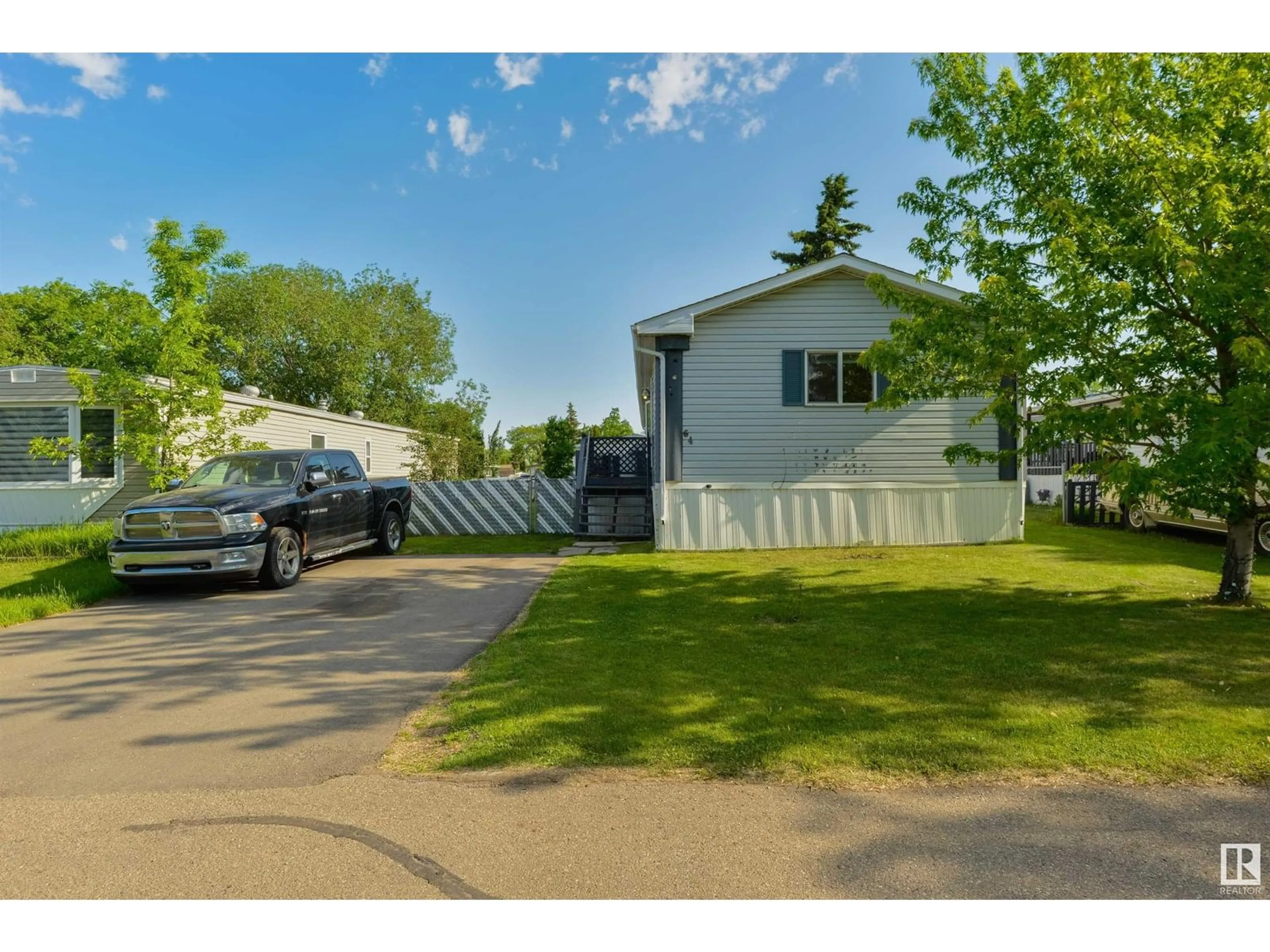 A pic from outside/outdoor area/front of a property/back of a property/a pic from drone, street for 64 RIM RD, Edmonton Alberta T6P1C2