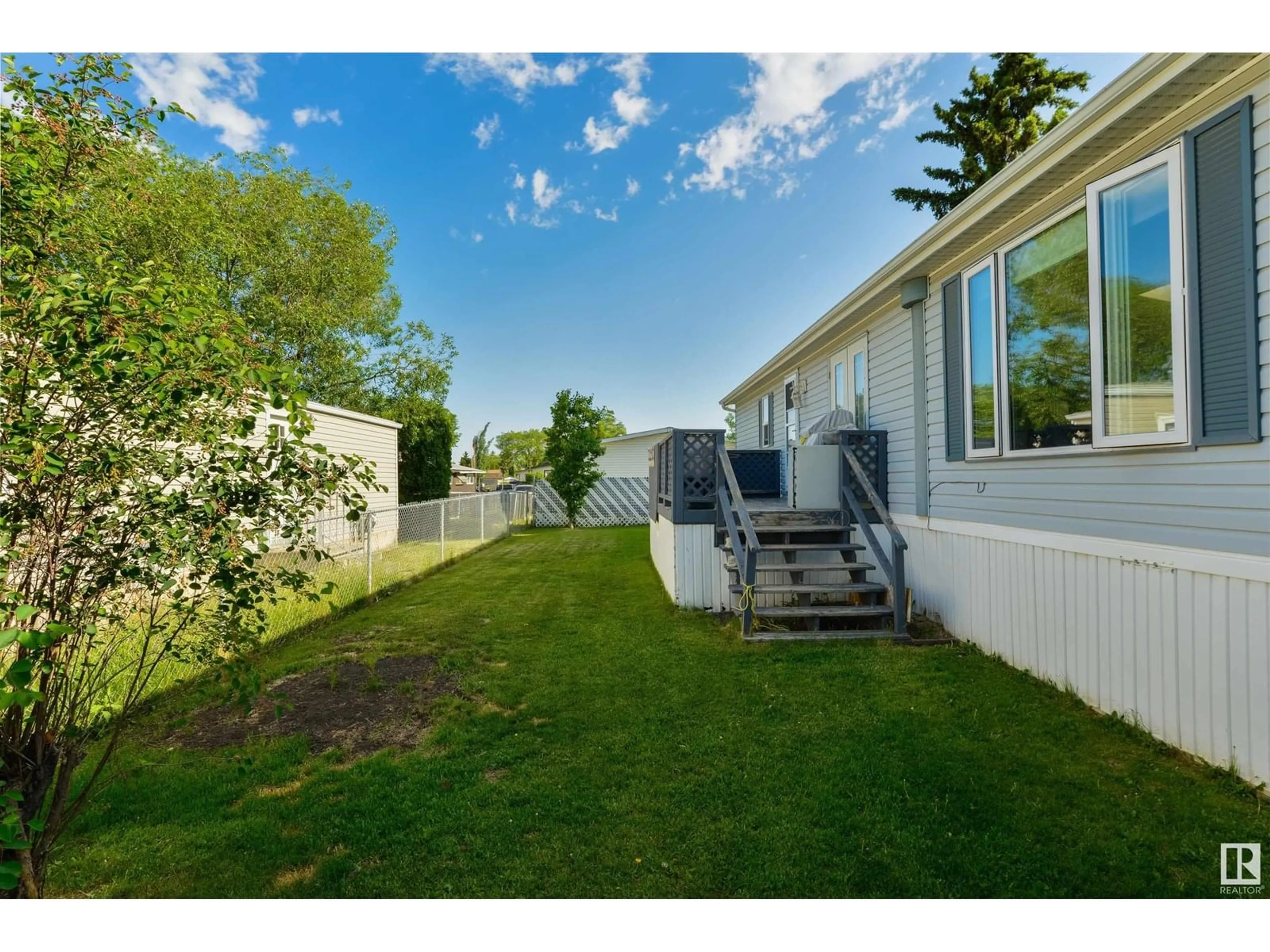 Patio, water/lake/river/ocean view for 64 RIM RD, Edmonton Alberta T6P1C2