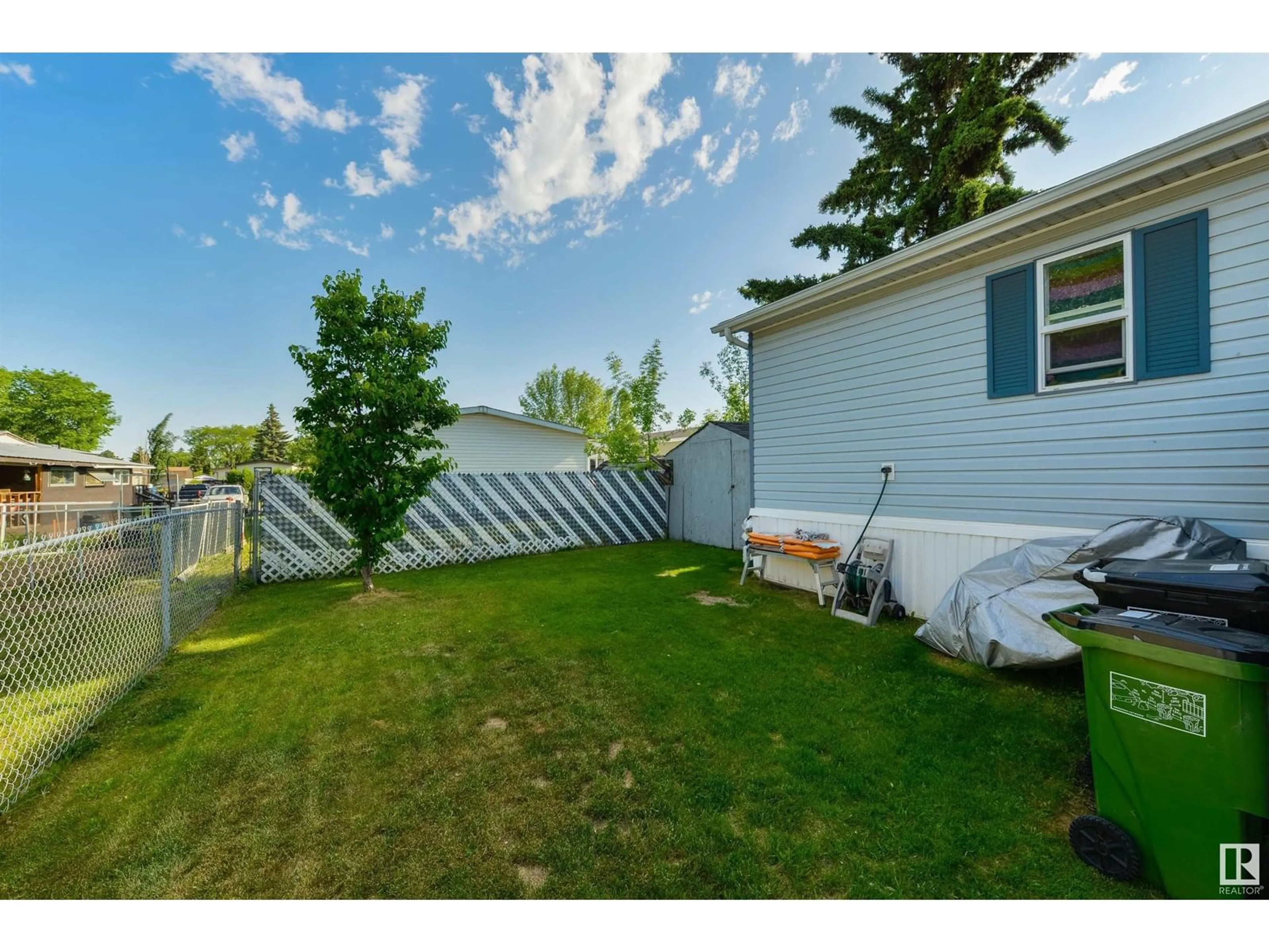 Patio, water/lake/river/ocean view for 64 RIM RD, Edmonton Alberta T6P1C2