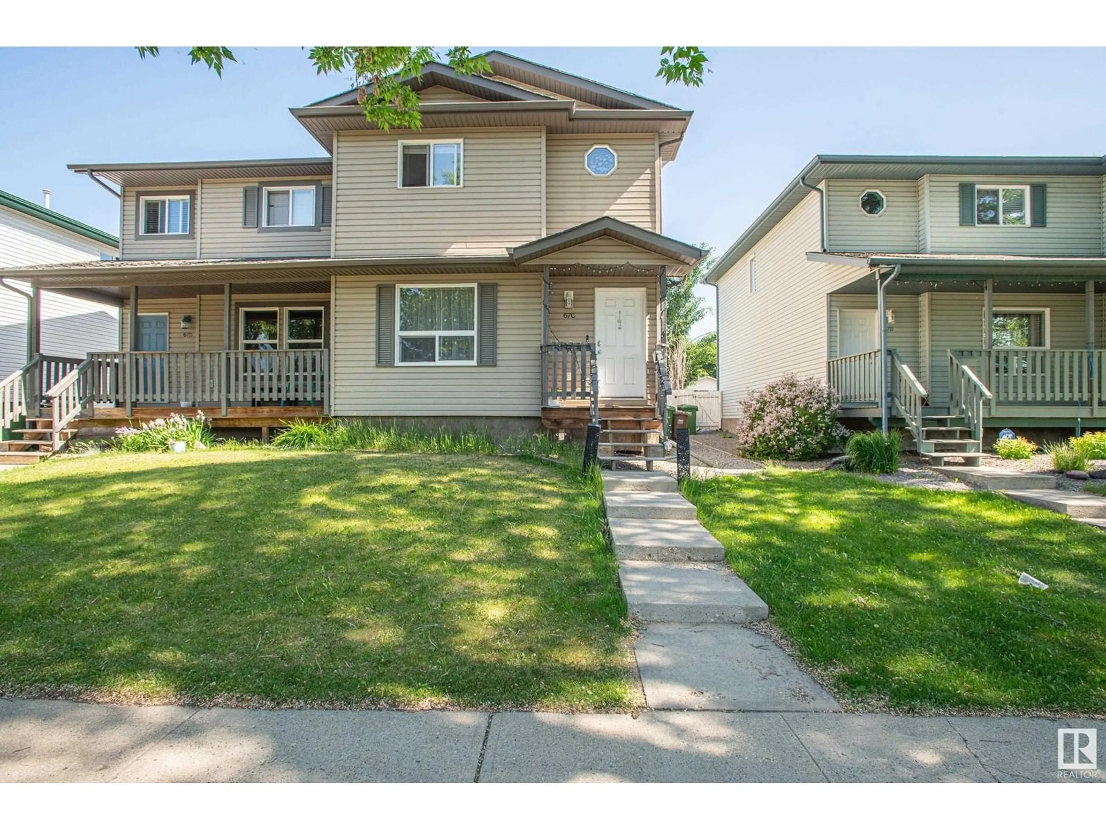Home with vinyl exterior material, street for 67C MISSION AV, St. Albert Alberta T8N1H8