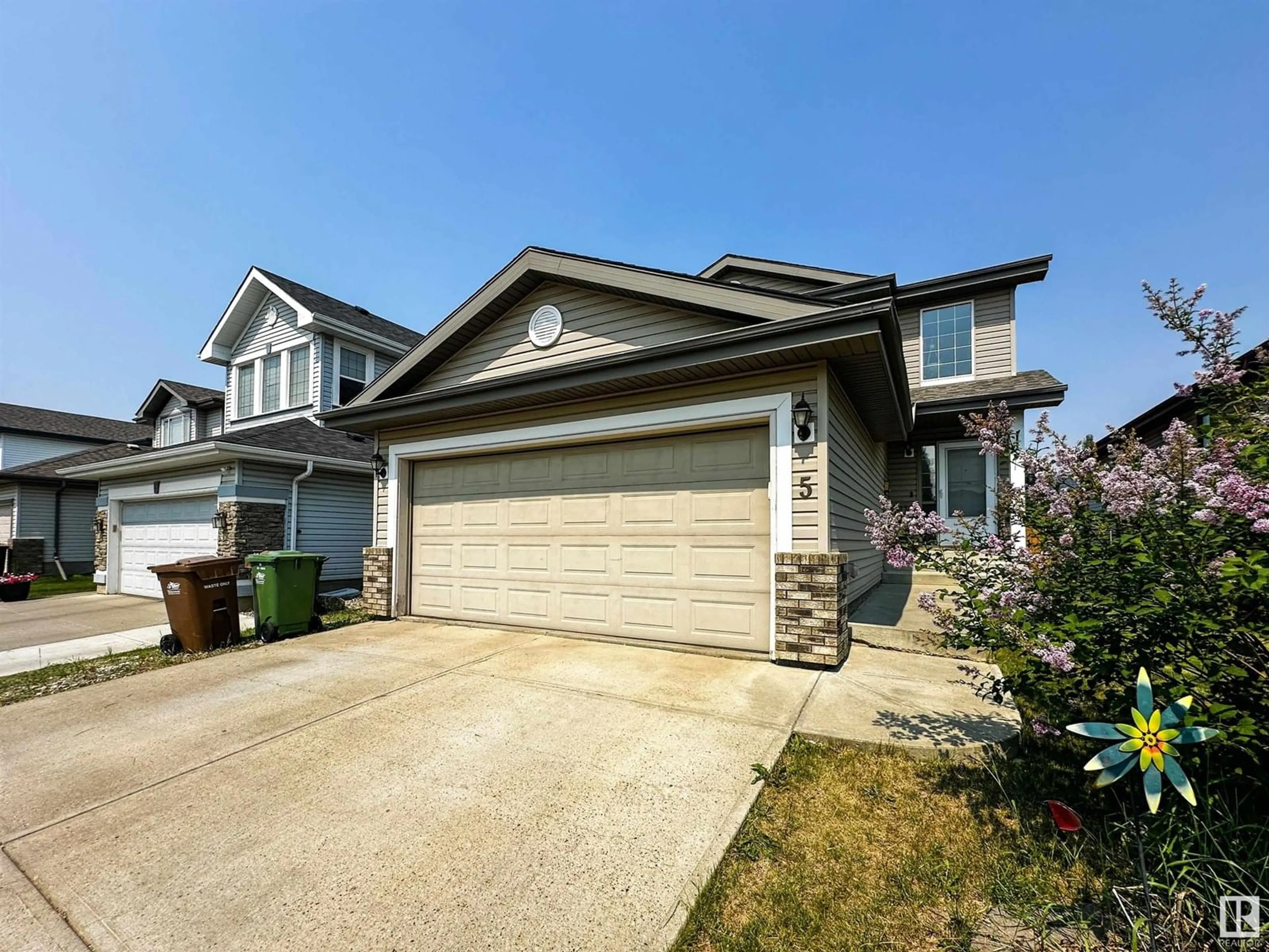 Home with vinyl exterior material, street for 5 NASH CL, St. Albert Alberta T8N7E9