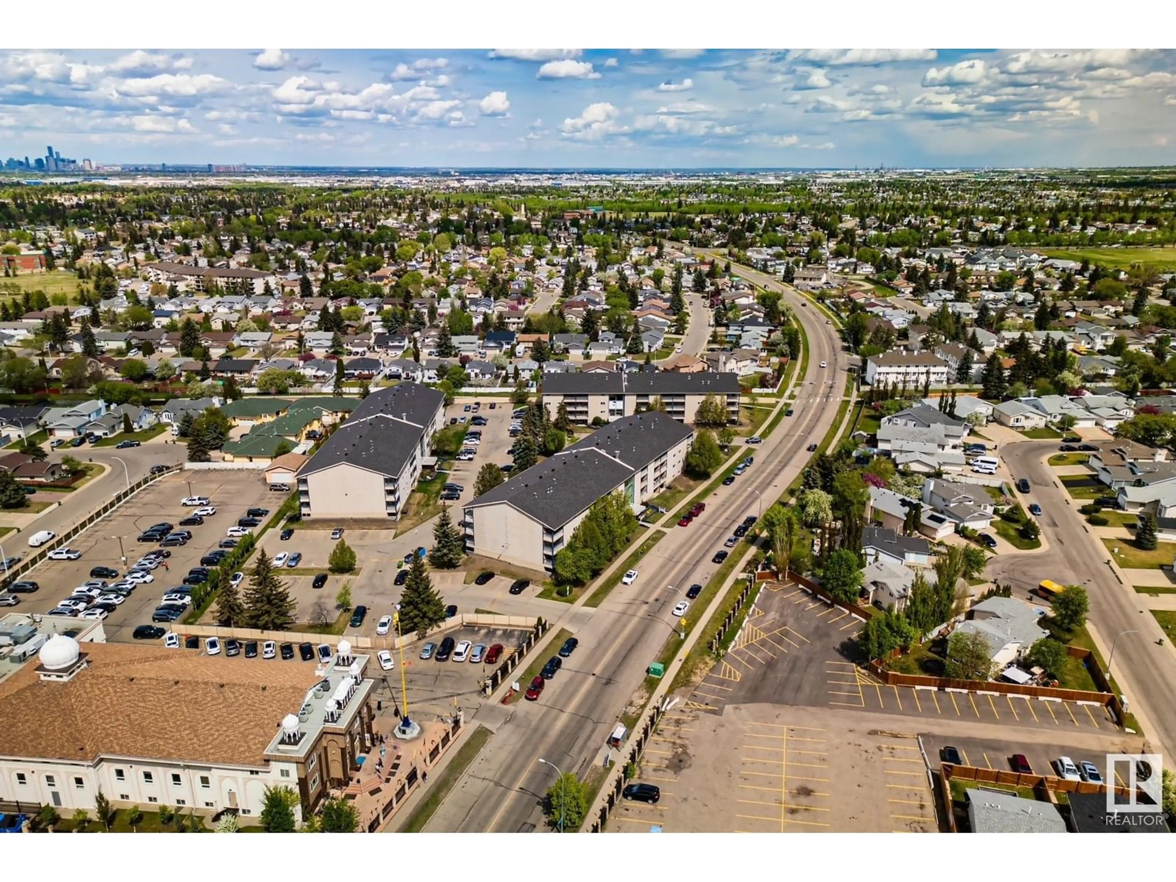 A pic from outside/outdoor area/front of a property/back of a property/a pic from drone, street for #304 - 2620 MILLWOODS ROAD EAST, Edmonton Alberta T6L5K6