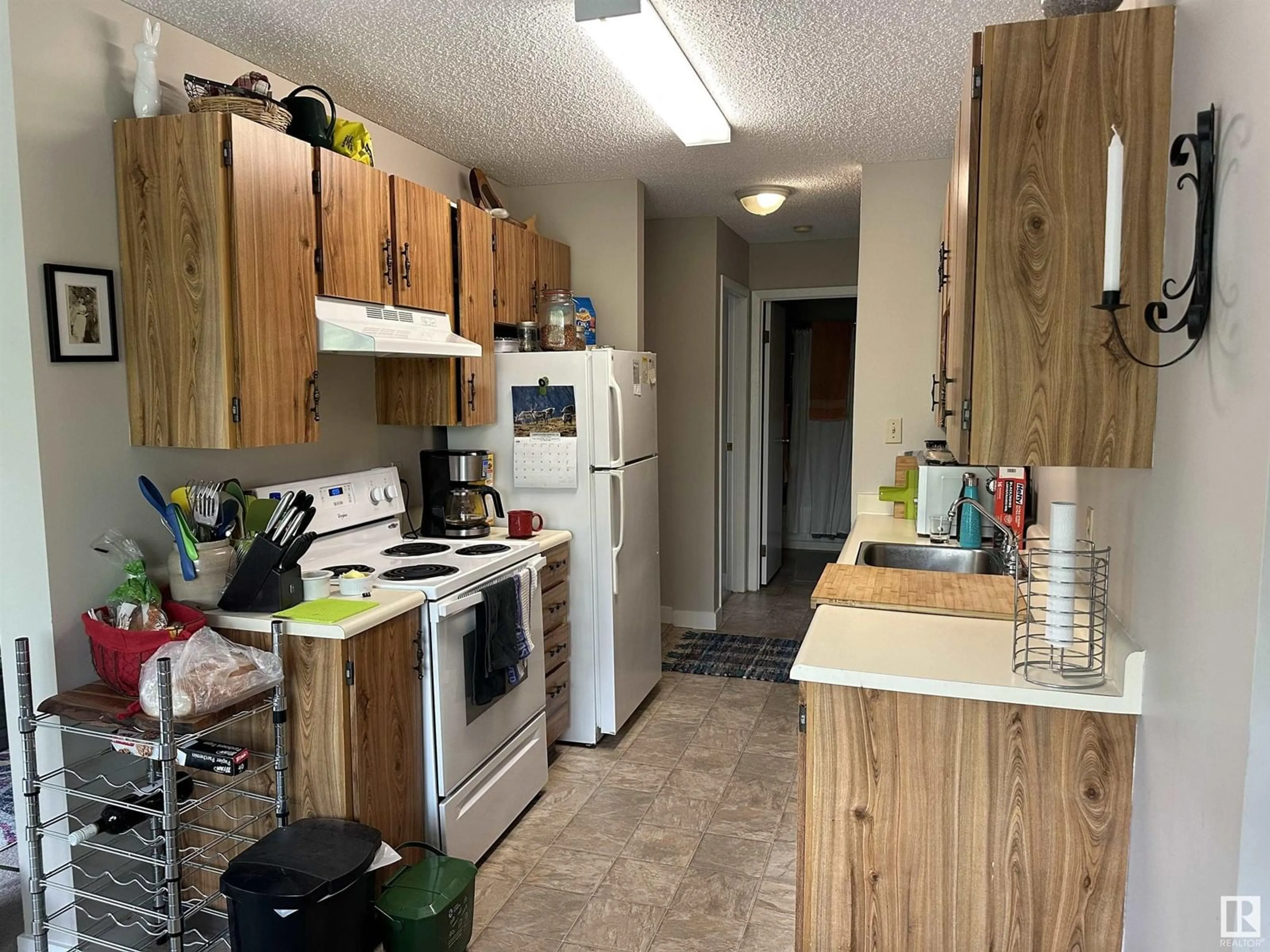 Standard kitchen, wood/laminate floor for 301 - 10842 107 ST NW, Edmonton Alberta T5H2Z3